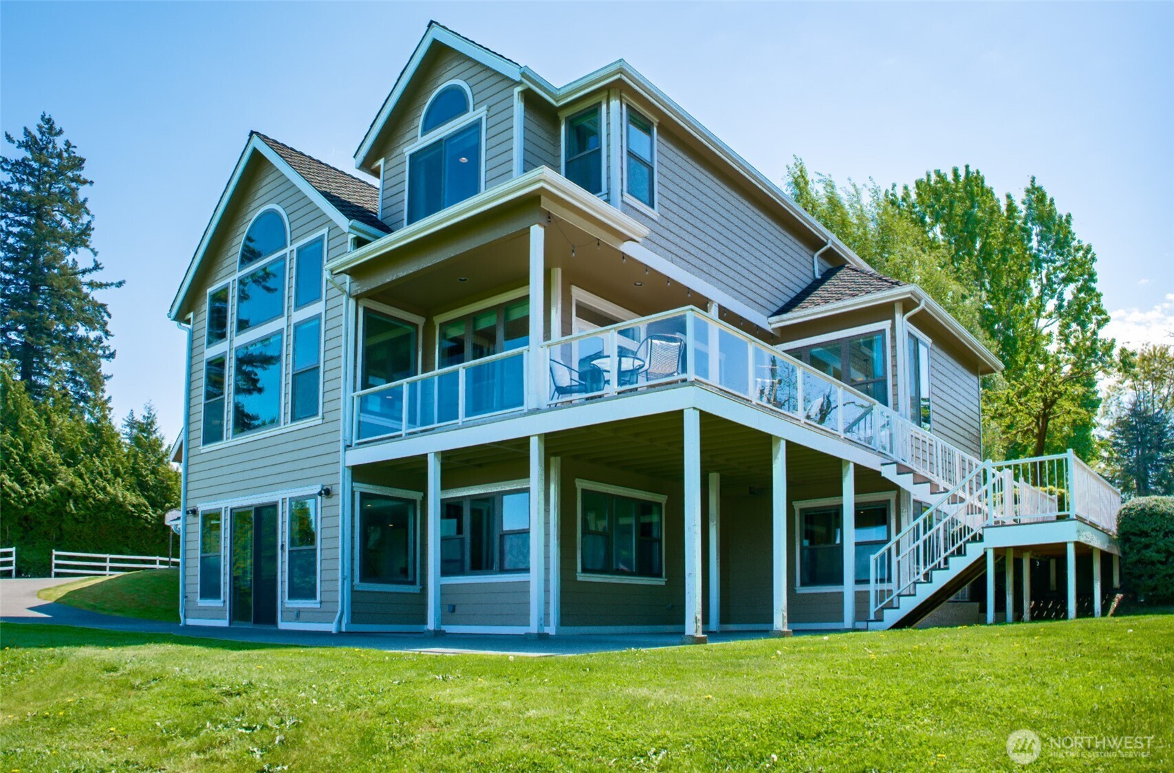 746 Van Dyk Road Lynden, WA 98264 - Photo 36 of 40 a view of a house with a yard and plants