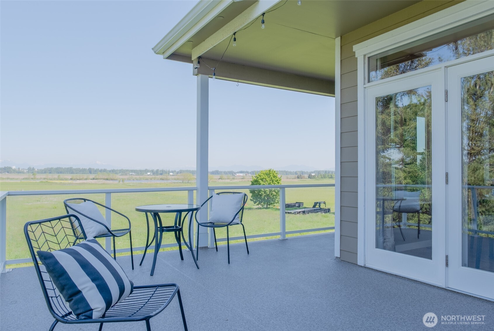 746 Van Dyk Road Lynden, WA 98264 - Photo 37 of 40 a view of chairs and table in patio