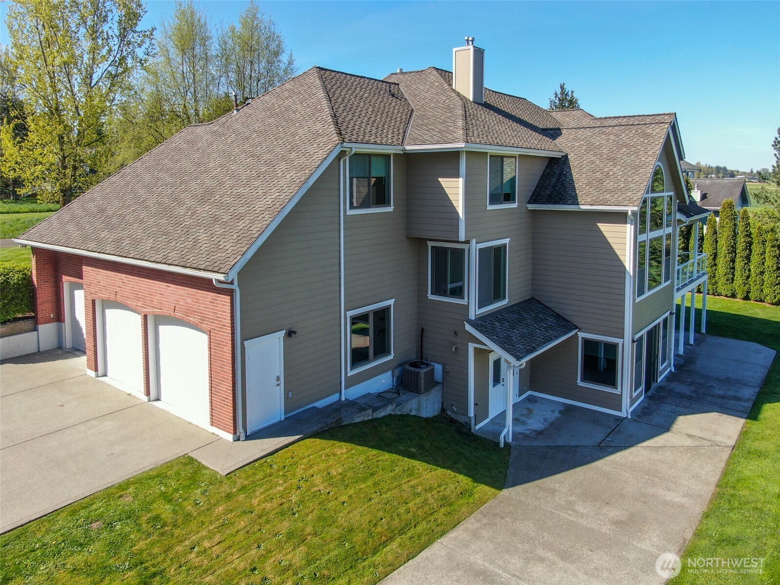 746 Van Dyk Road Lynden, WA 98264 - Photo 38 of 40 a front view of a house with garden
