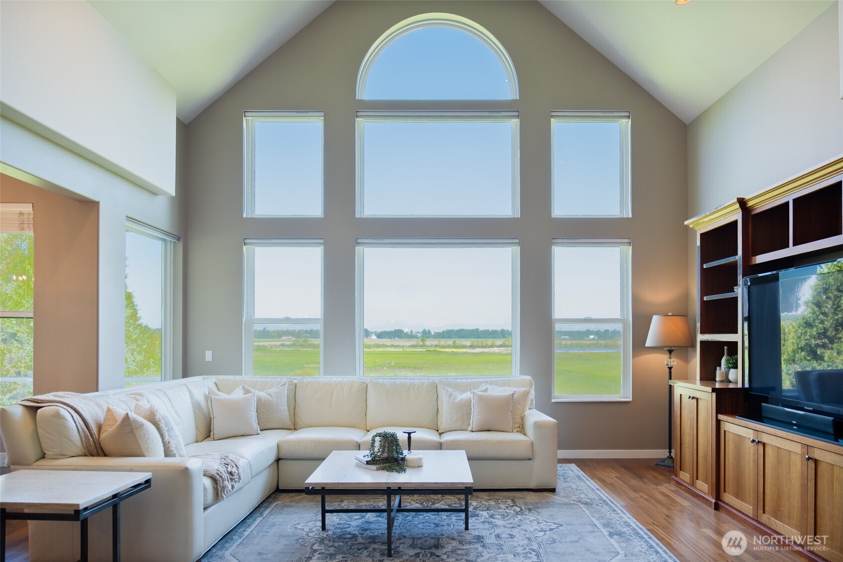 746 Van Dyk Road Lynden, WA 98264 - Photo 6 of 40 a living room with furniture and a large window