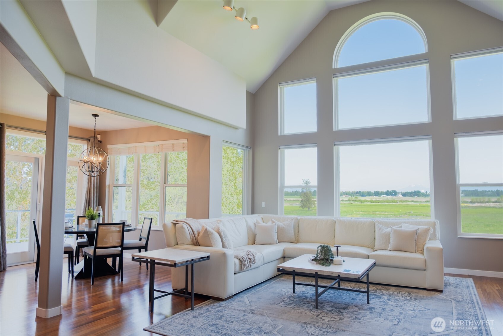 746 Van Dyk Road Lynden, WA 98264 - Photo 8 of 40 a living room with furniture and a large window