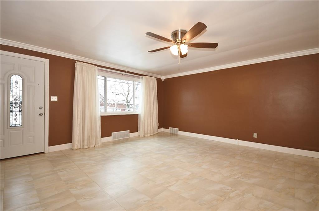 413 Grove Road Verona, PA 15147 - Photo 11 of 25 Living Room: Large open area allows for many furniture configurations.