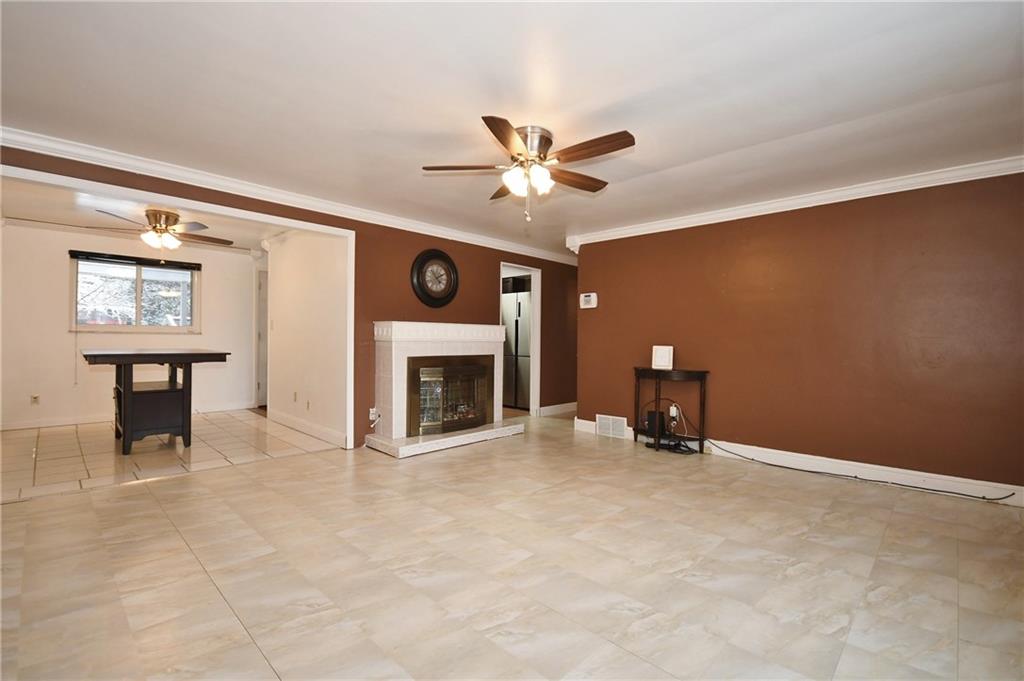 413 Grove Road Verona, PA 15147 - Photo 12 of 25 Living Room: Decorative mantle included, and can be easily moved to another wall!