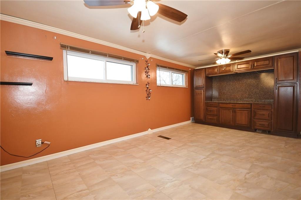 413 Grove Road Verona, PA 15147 - Photo 14 of 25 Master Bedroom: Built in storage and media center.