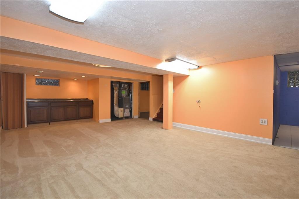 413 Grove Road Verona, PA 15147 - Photo 3 of 25 Finished gameroom, perfect for entertaining. Endless possibilities!