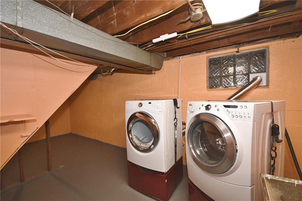 413 Grove Road Verona, PA 15147 - Photo 9 of 25 Clean laundry area, washer and dryer included, plenty of additional storage space.