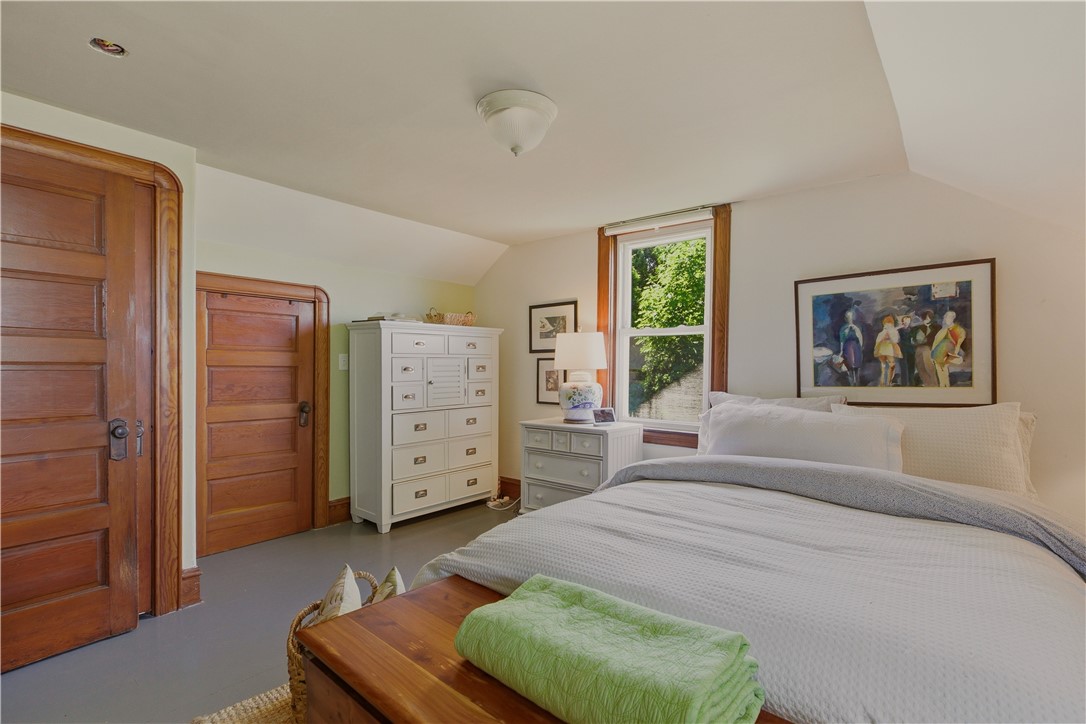 1536 Main Road Tiverton, RI 02878 - Photo 24 of 34 Primary bedroom with plenty of light, views of harbor and two closets