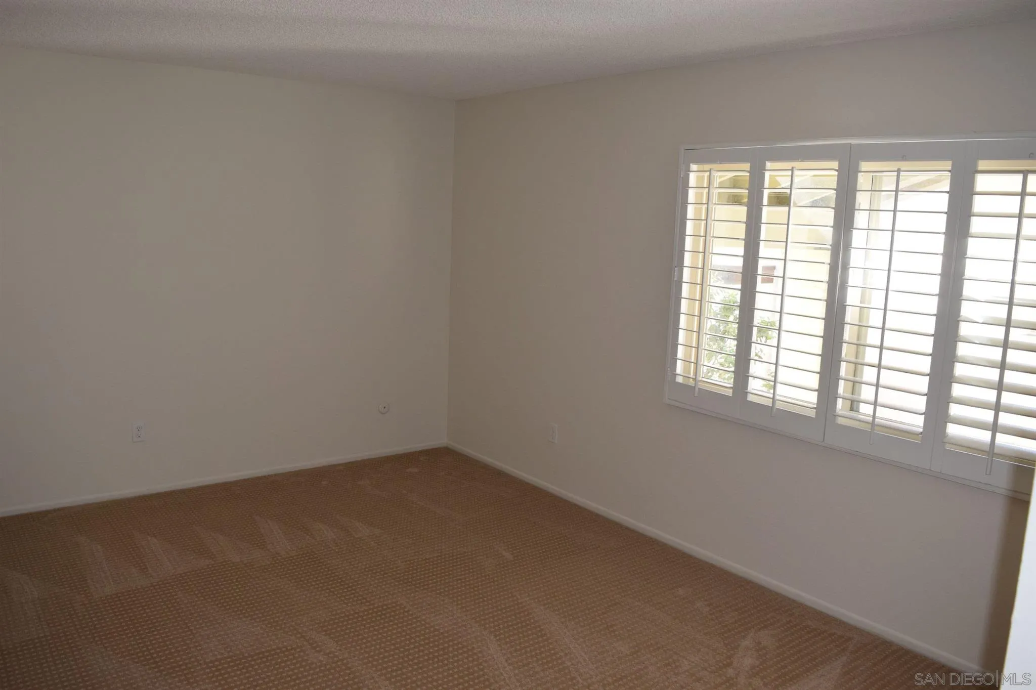 70 Trinidad Bend Coronado, CA 92118 - Photo 14 of 44 an empty room with a window