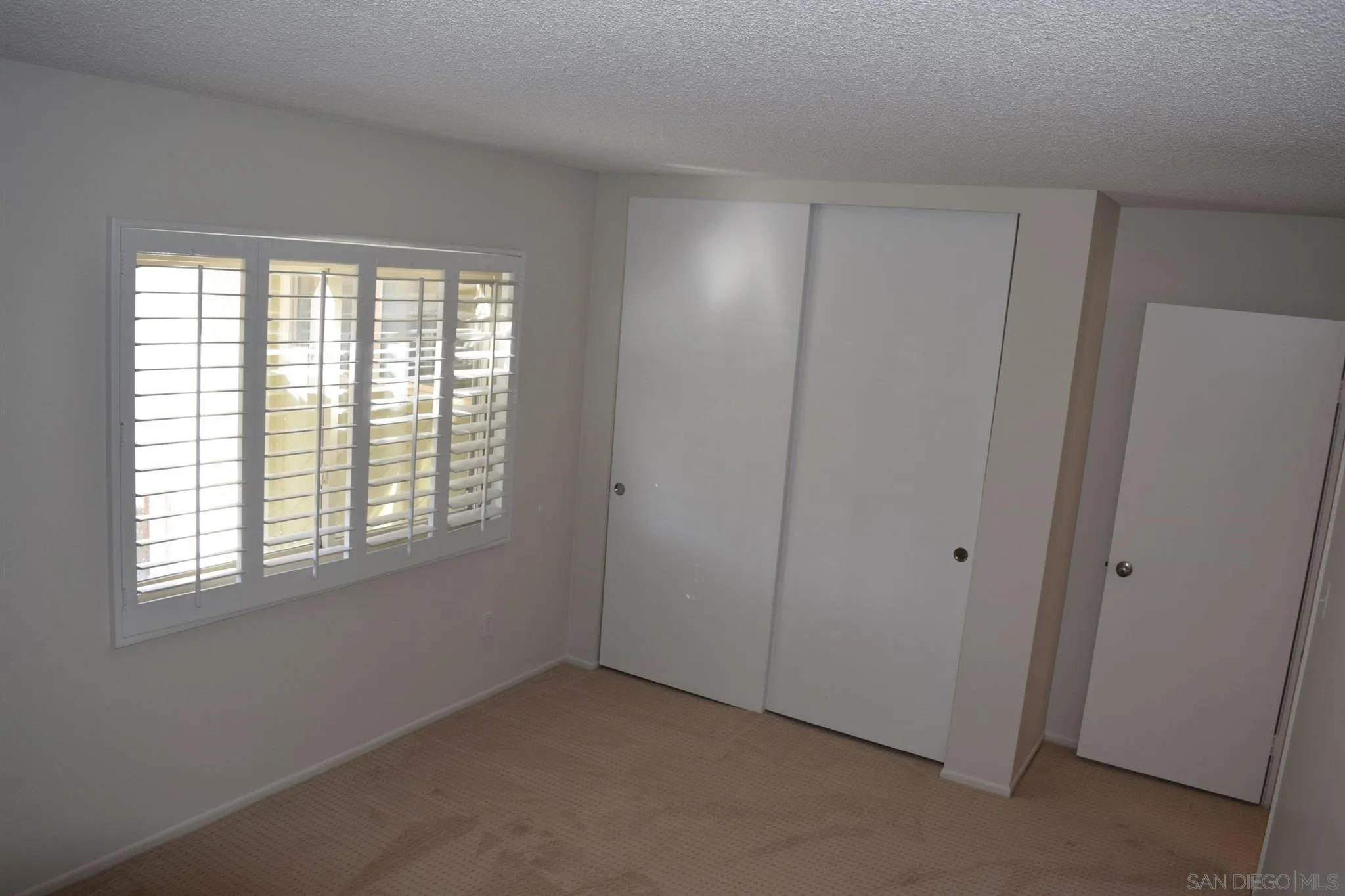 70 Trinidad Bend Coronado, CA 92118 - Photo 15 of 44 a view of an empty room with a window