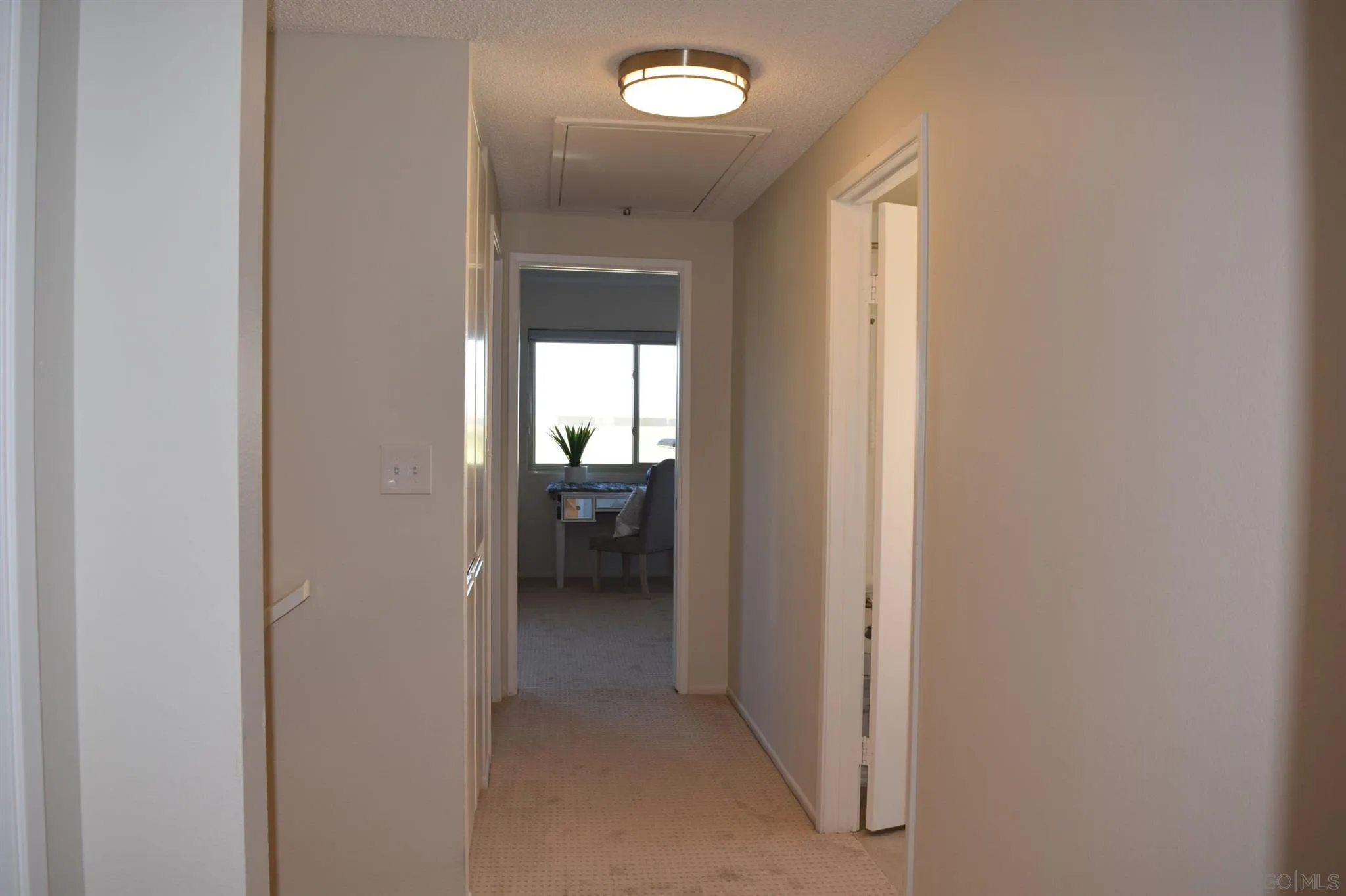 70 Trinidad Bend Coronado, CA 92118 - Photo 16 of 44 a view of a bathroom from a hallway