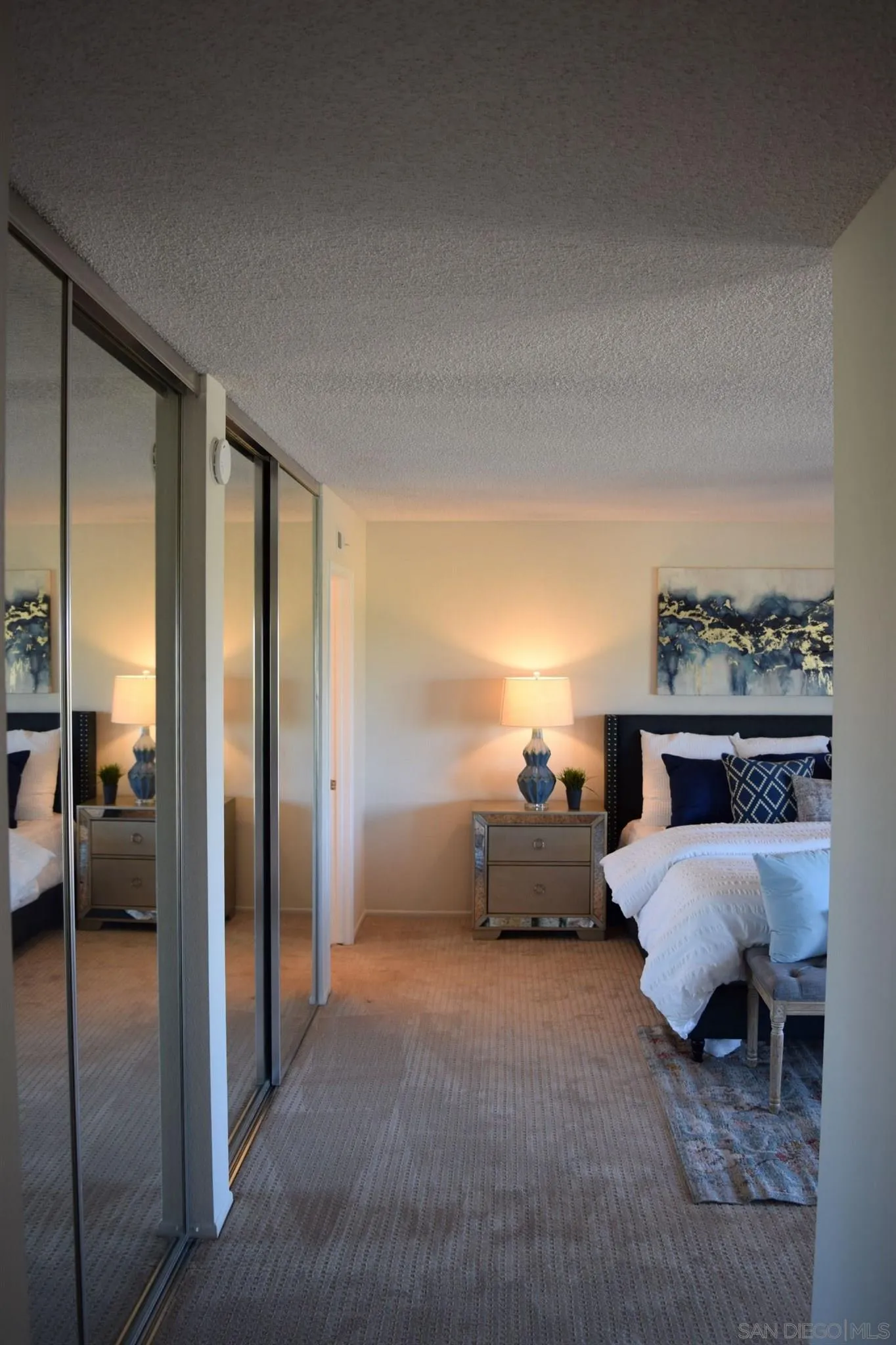 70 Trinidad Bend Coronado, CA 92118 - Photo 19 of 44 a bedroom with furniture and a window