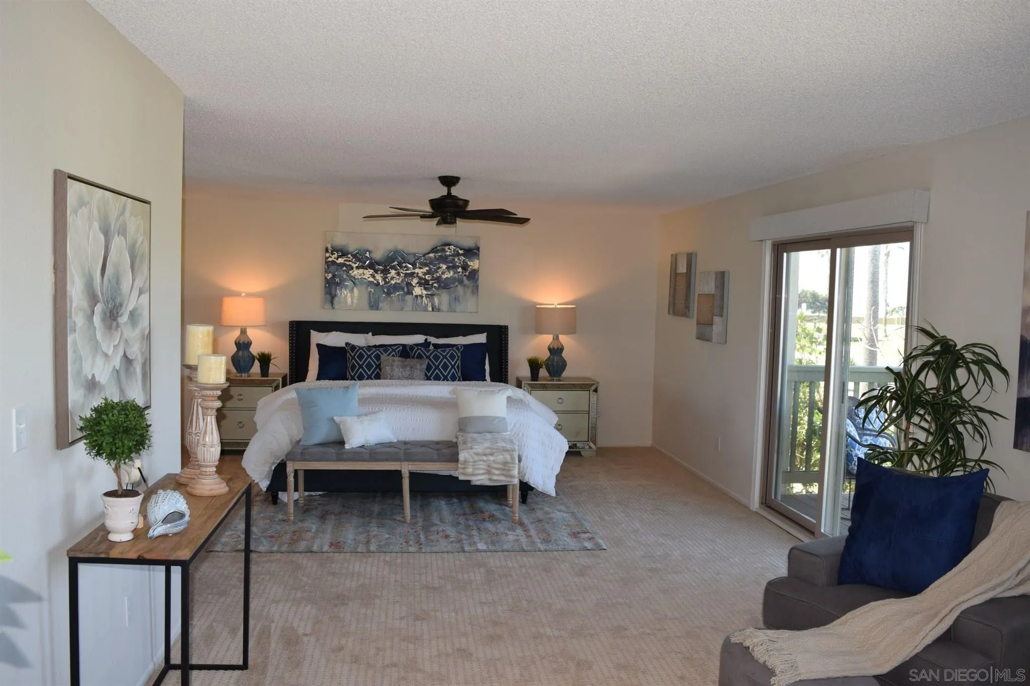 70 Trinidad Bend Coronado, CA 92118 - Photo 21 of 44 a bedroom with a bed and a potted plant