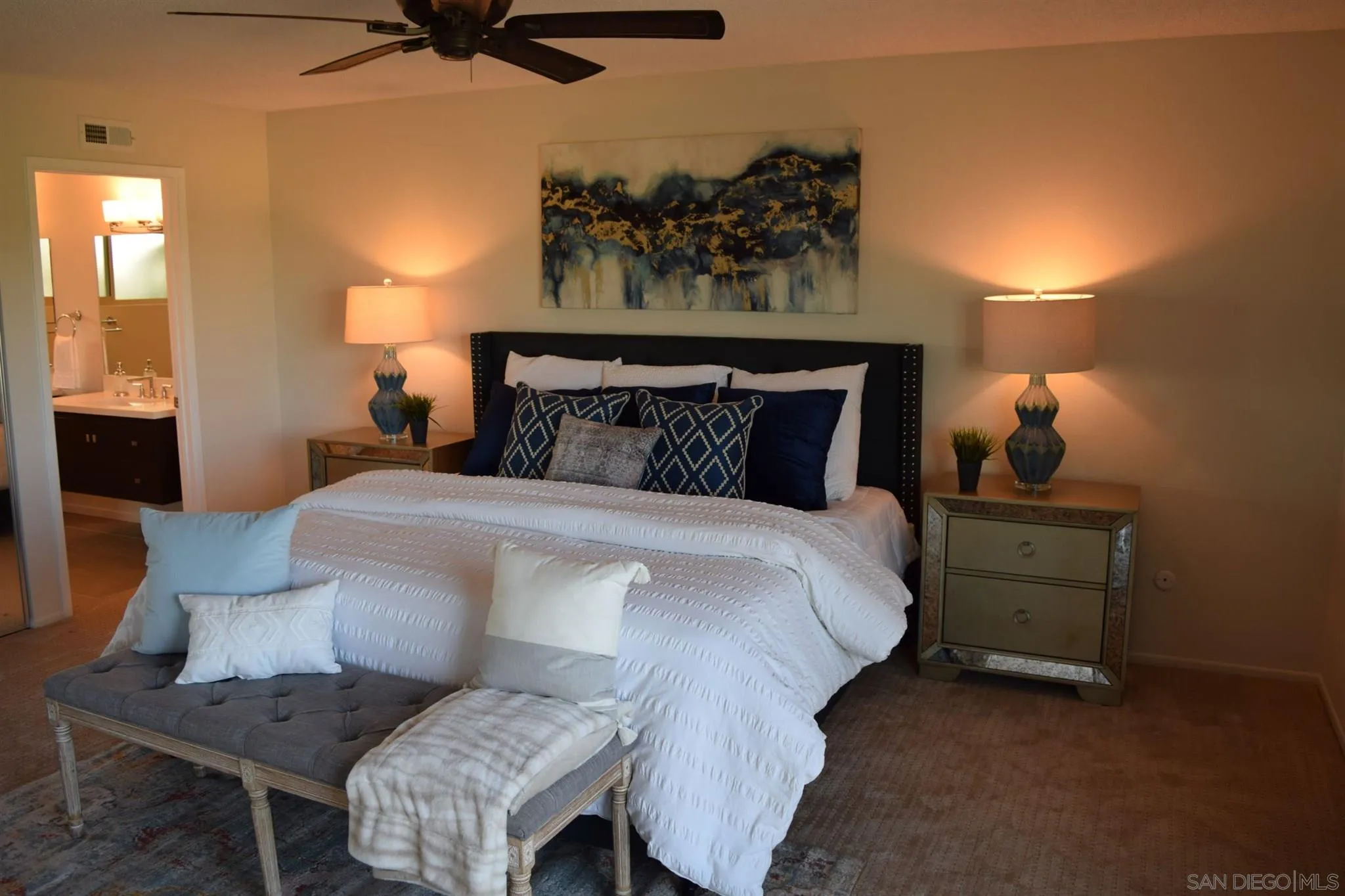 70 Trinidad Bend Coronado, CA 92118 - Photo 22 of 44 a bedroom with a bed and wooden floor