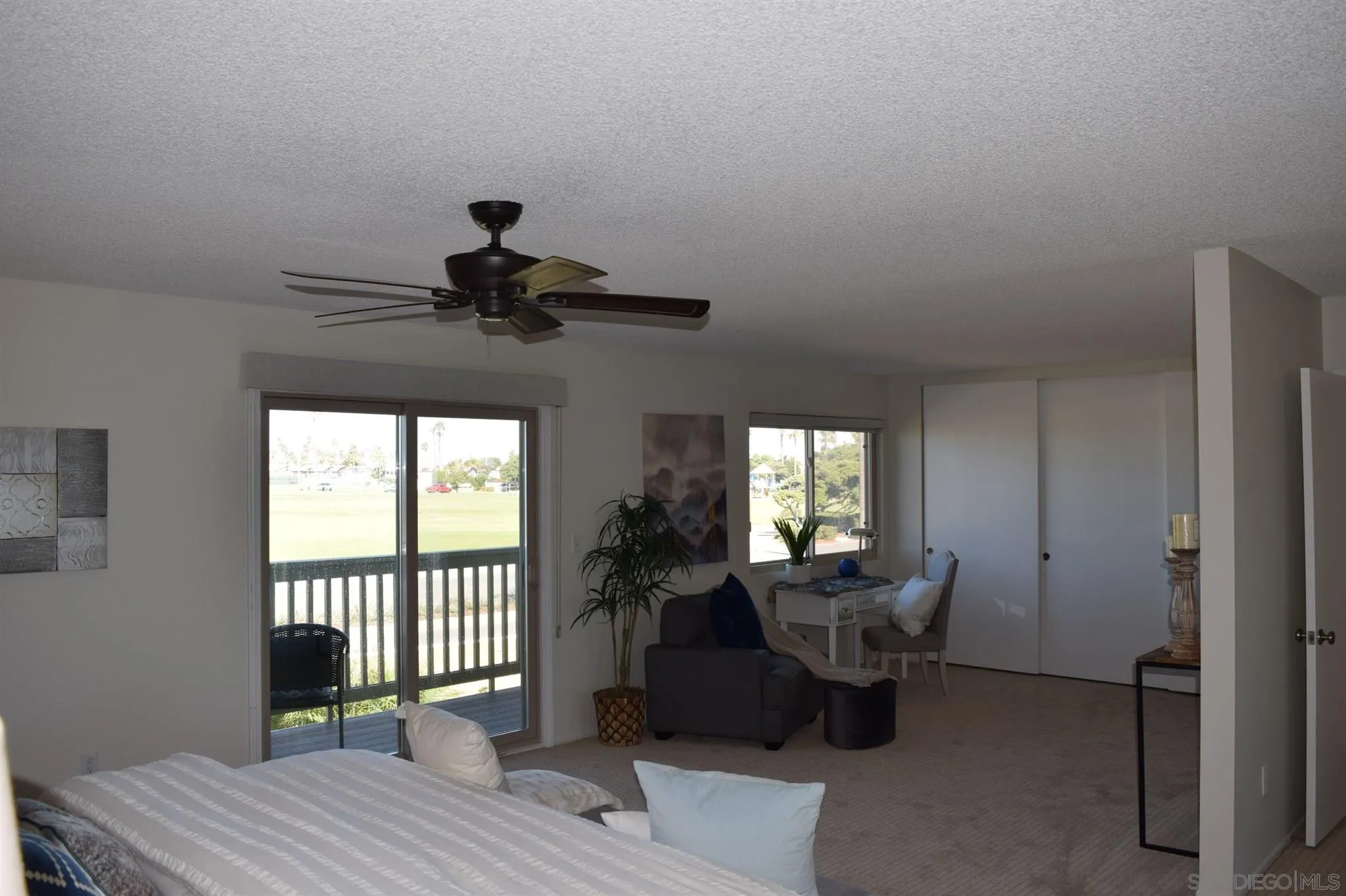 70 Trinidad Bend Coronado, CA 92118 - Photo 24 of 44 a living room with furniture and a window