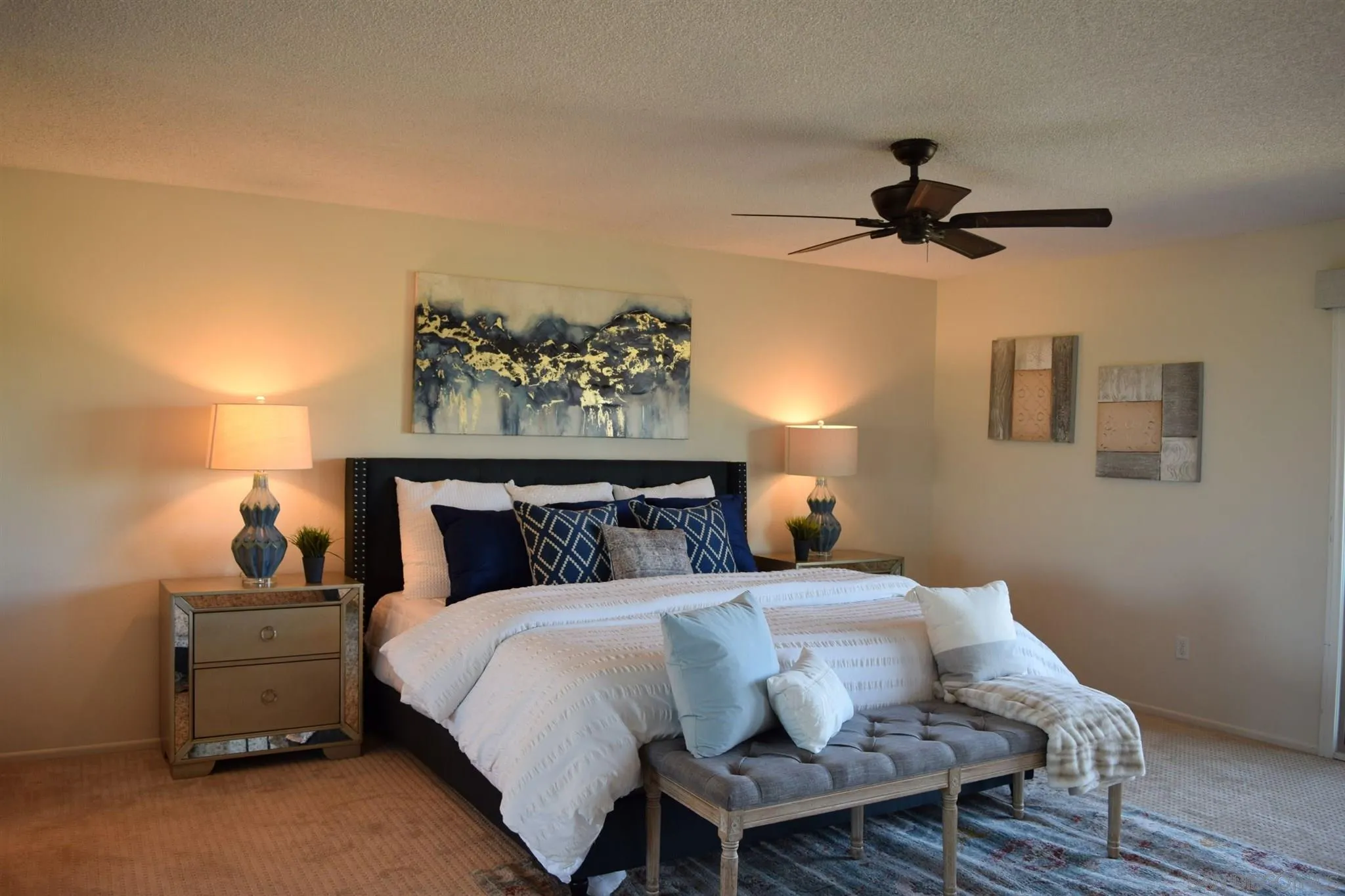70 Trinidad Bend Coronado, CA 92118 - Photo 25 of 44 a bed room with a bed and a chandelier