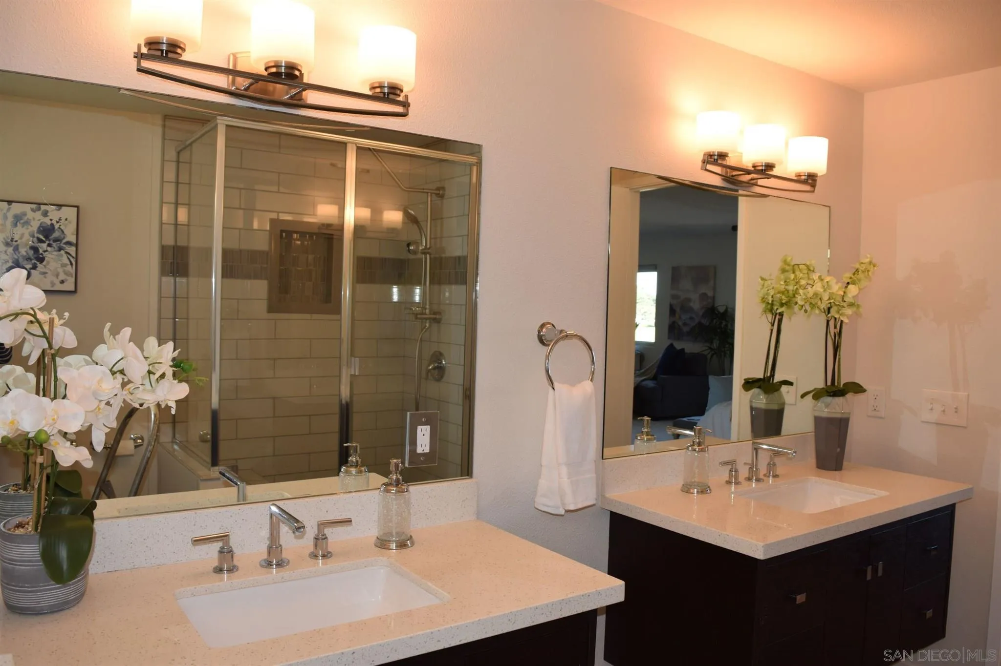 70 Trinidad Bend Coronado, CA 92118 - Photo 28 of 44 a bathroom with a sink and a mirror