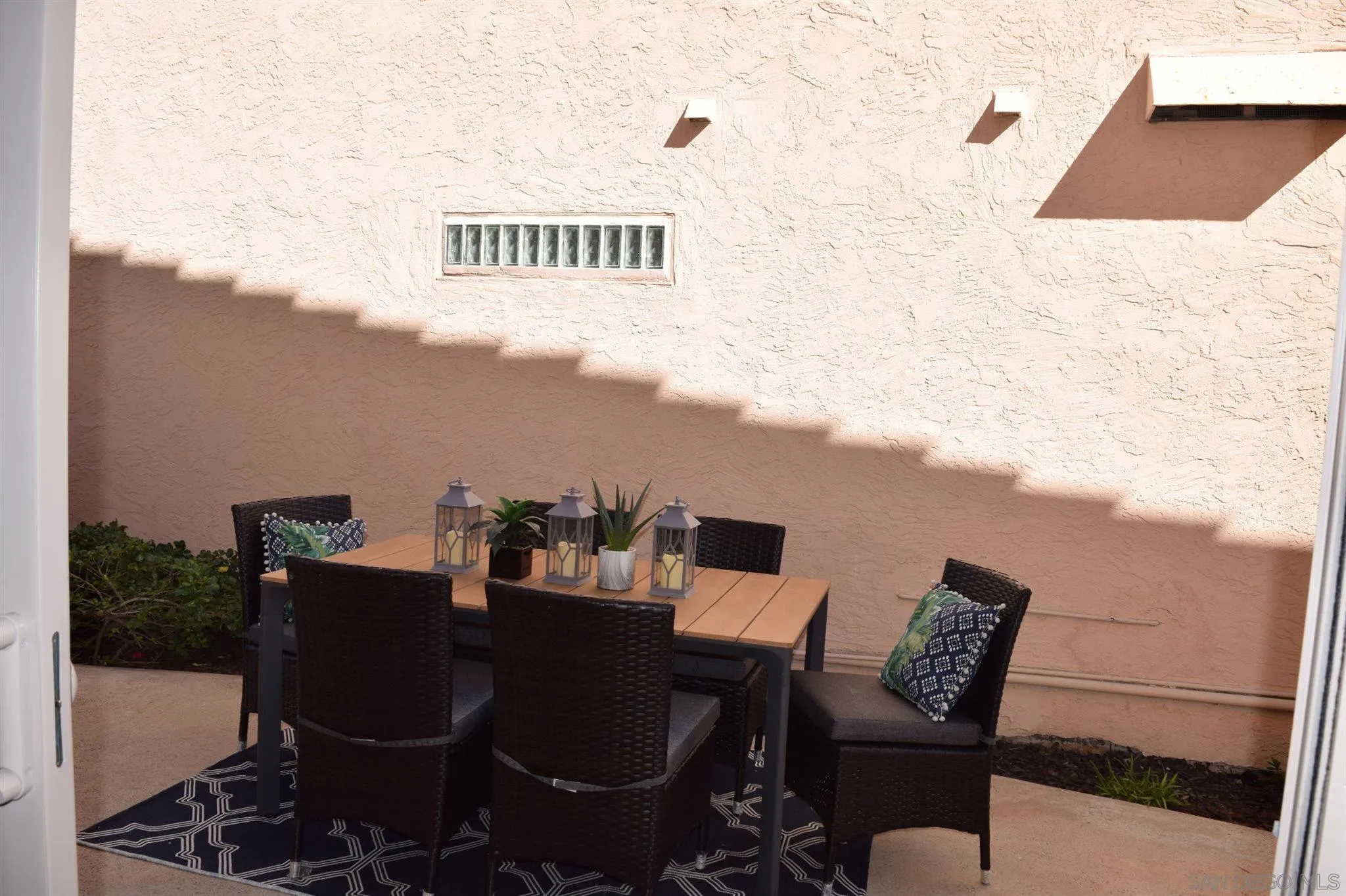 70 Trinidad Bend Coronado, CA 92118 - Photo 38 of 44 a terrace of a house with outdoor seating