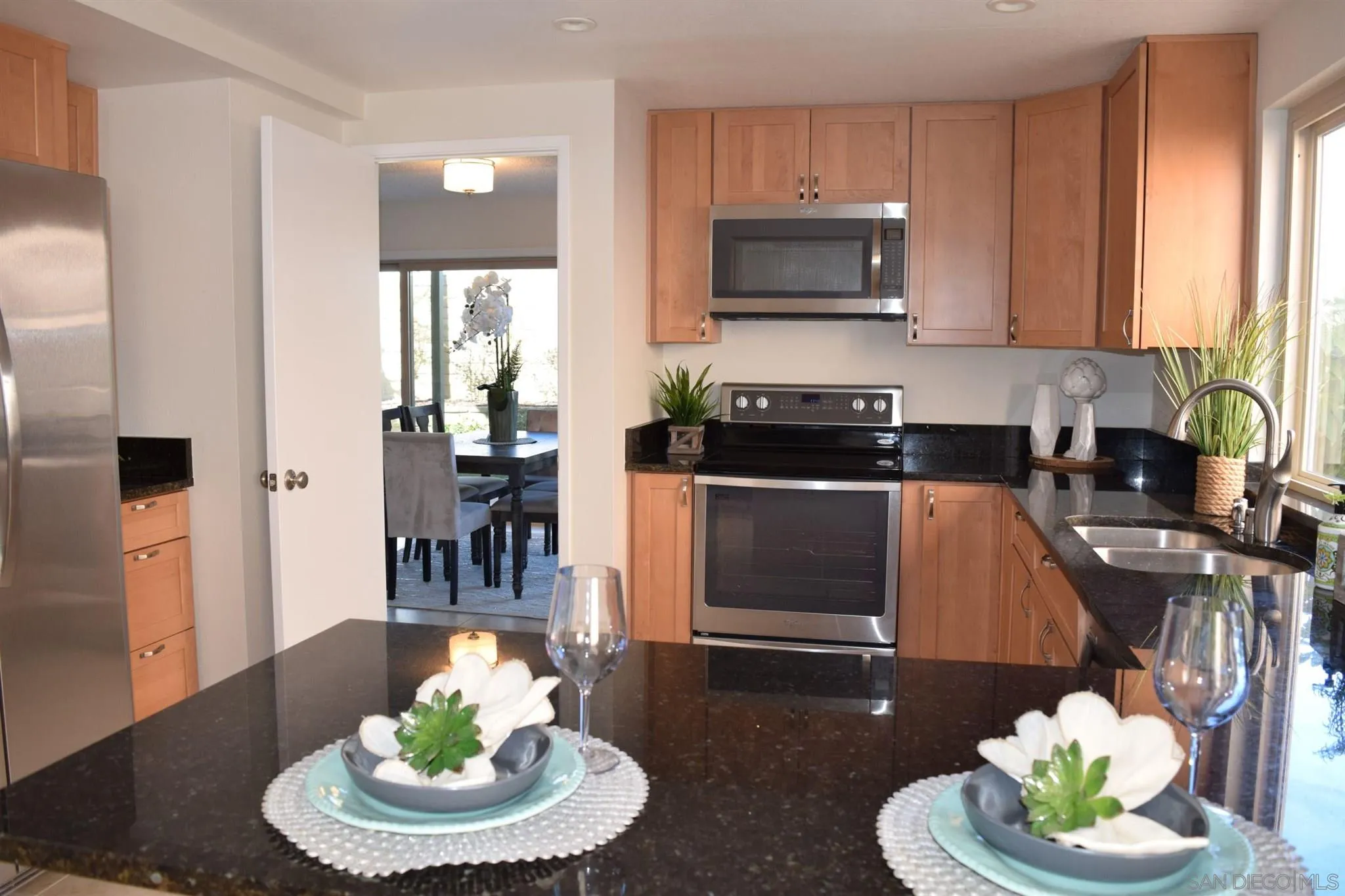 70 Trinidad Bend Coronado, CA 92118 - Photo 41 of 44 a kitchen with a sink and a stove