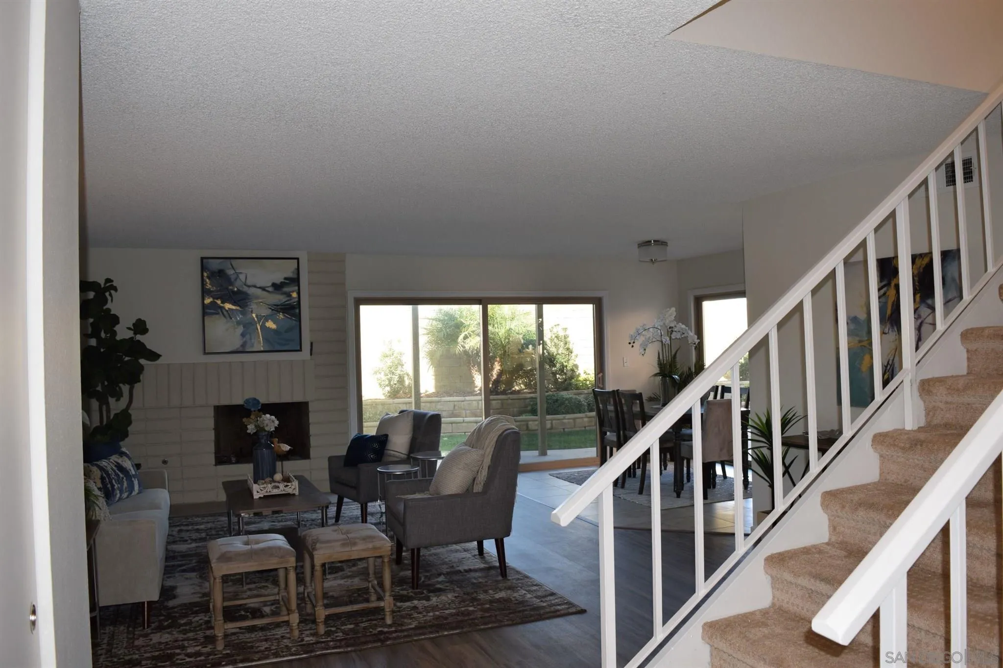 70 Trinidad Bend Coronado, CA 92118 - Photo 5 of 44 a living room with furniture and a floor to ceiling window