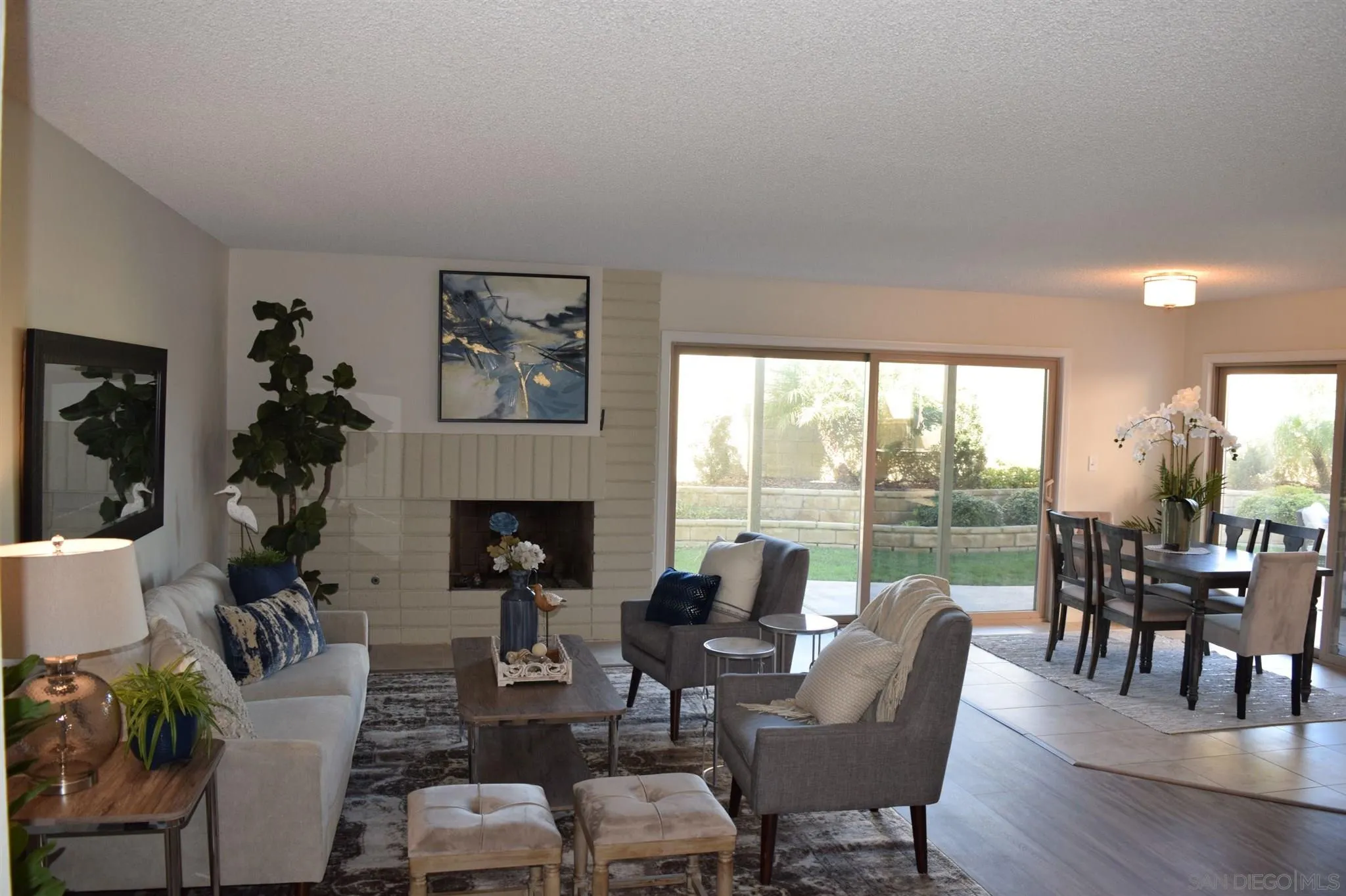 70 Trinidad Bend Coronado, CA 92118 - Photo 6 of 44 a dining room with furniture window and wooden floor