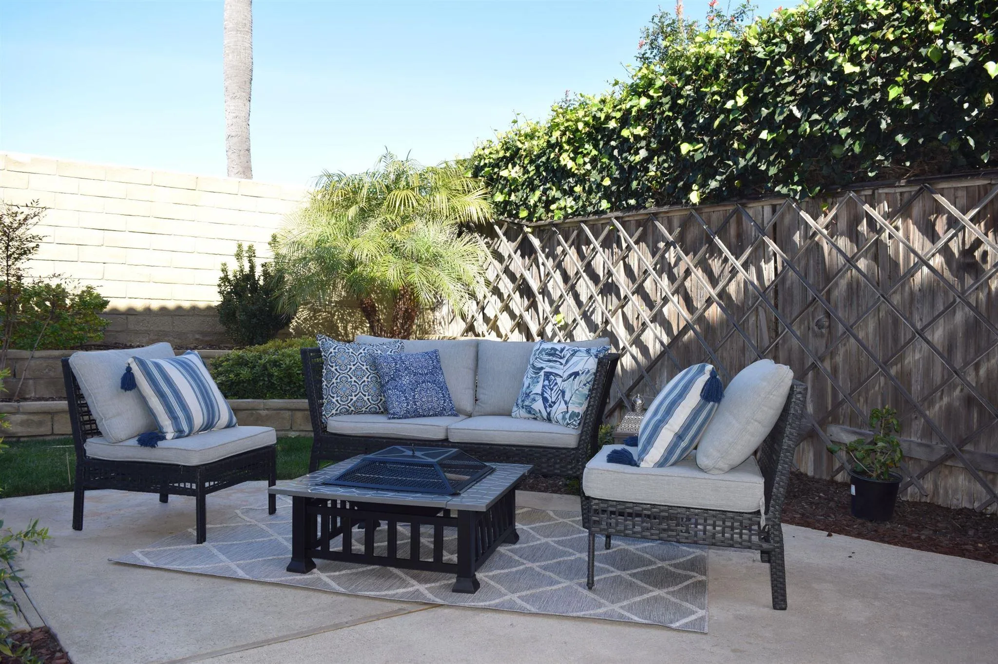 70 Trinidad Bend Coronado, CA 92118 - Photo 8 of 44 a outdoor sitting area with a couch and chairs