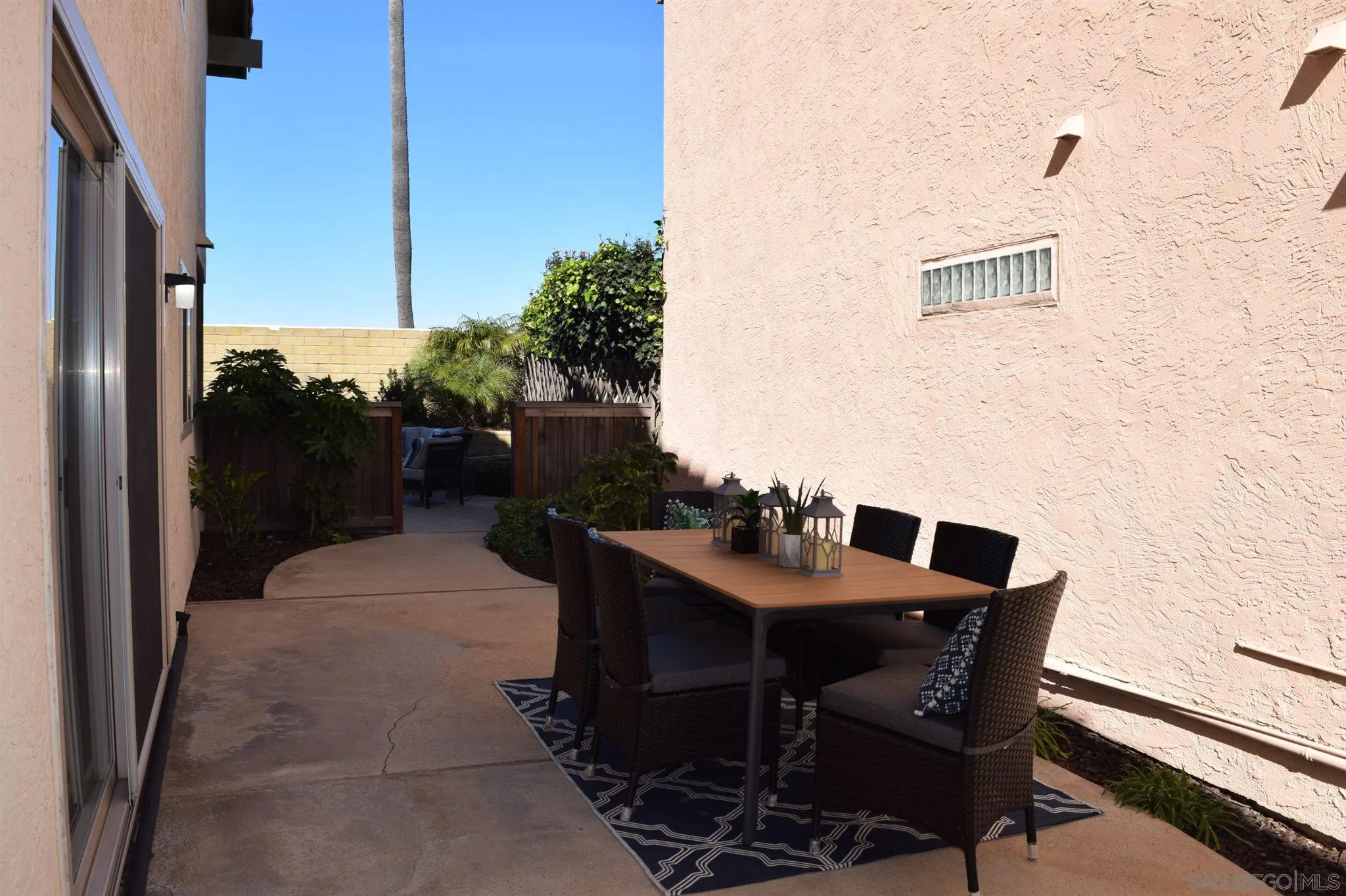 70 Trinidad Bend Coronado, CA 92118 - Photo 10 of 44 a patio with table and chairs