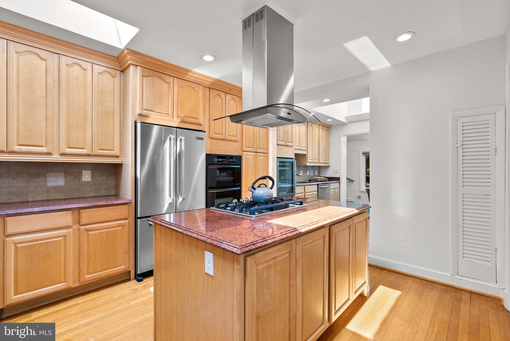 2816 Linden Lane Silver Spring, MD 20910 - Photo 11 of 62 a kitchen with stainless steel appliances granite countertop a refrigerator a sink and a stove