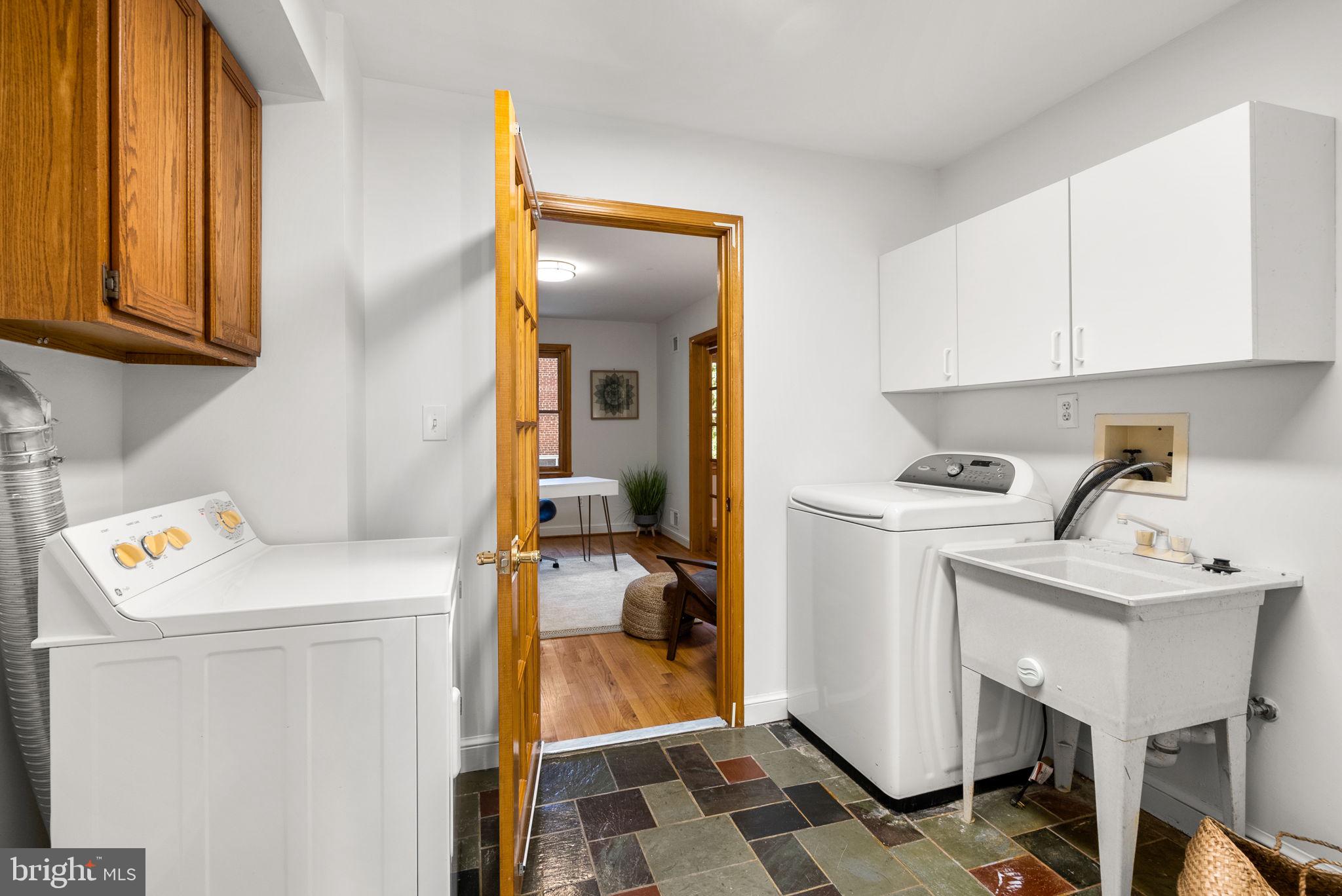 2816 Linden Lane Silver Spring, MD 20910 - Photo 24 of 62 a utility room with dryer and washer