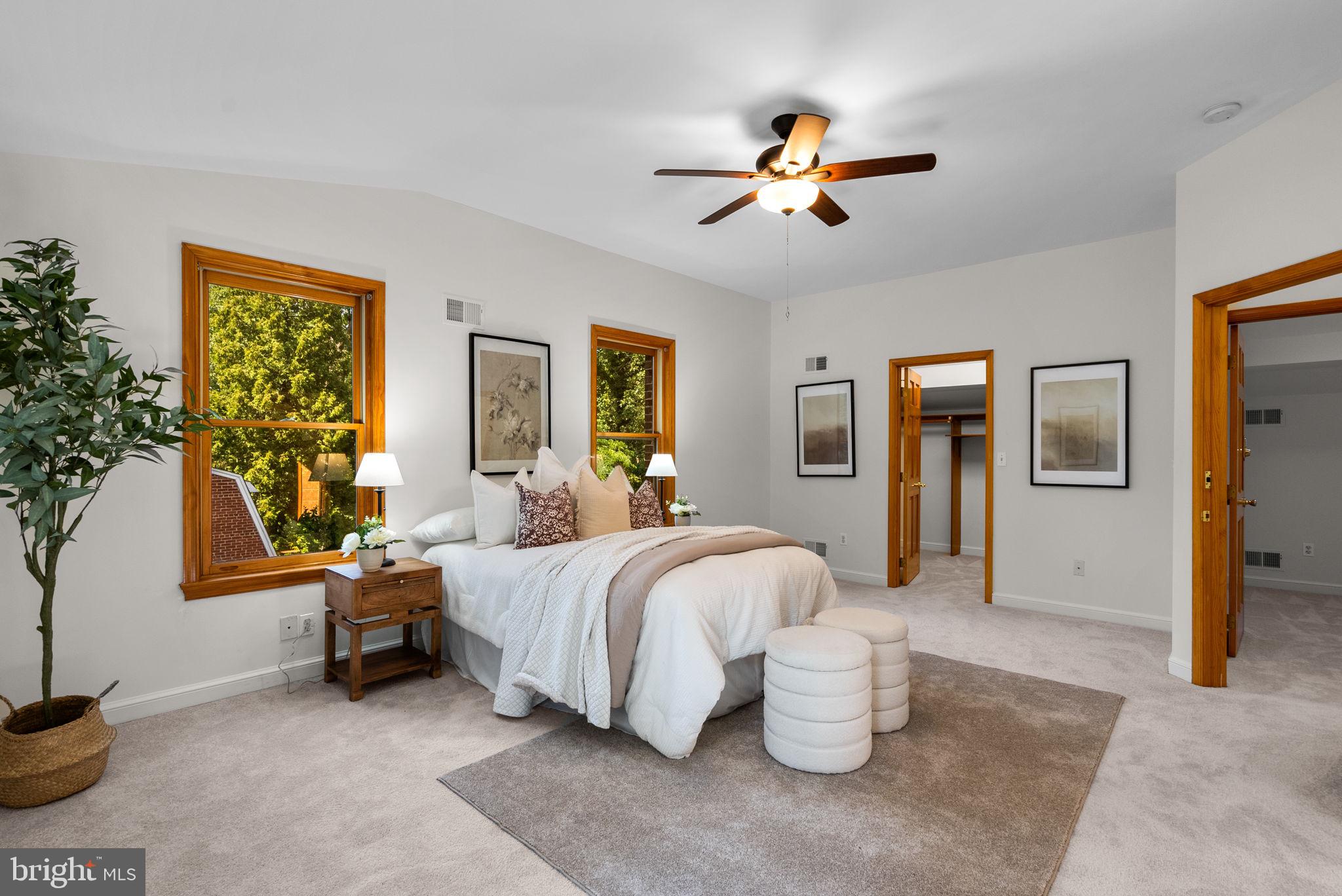 2816 Linden Lane Silver Spring, MD 20910 - Photo 26 of 62 a bedroom with a bed and a chandelier