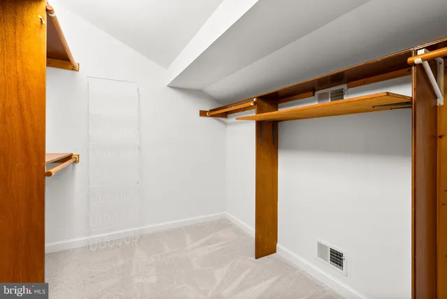 a bathroom with a sink a mirror and a bathtub