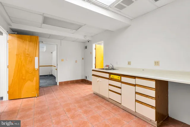 a backyard of a house with seating space