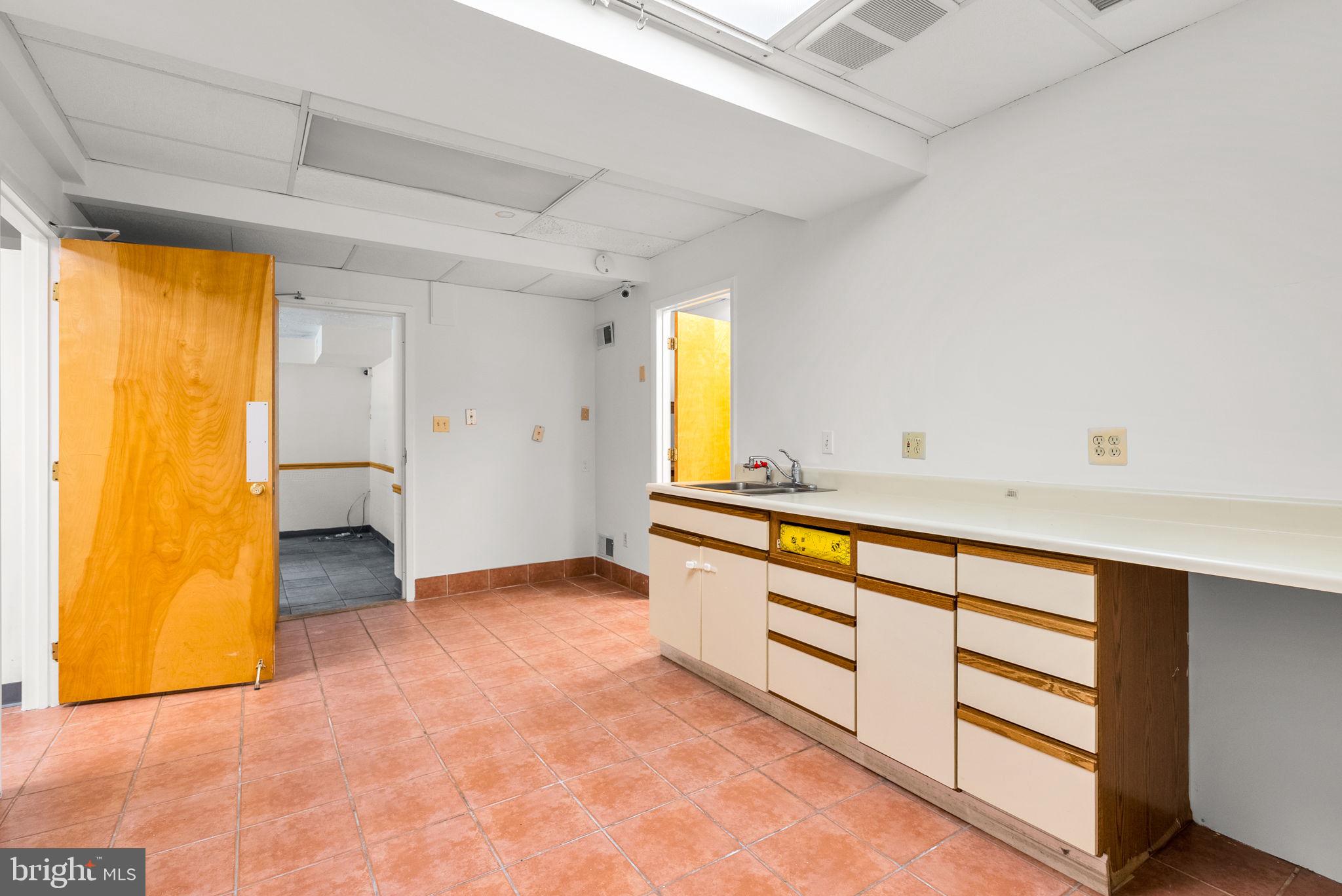 2816 Linden Lane Silver Spring, MD 20910 - Photo 43 of 62 a view of an empty room with window and bathroom