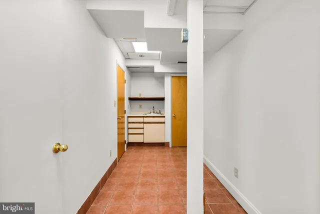 a view of balcony with wooden floor and fence