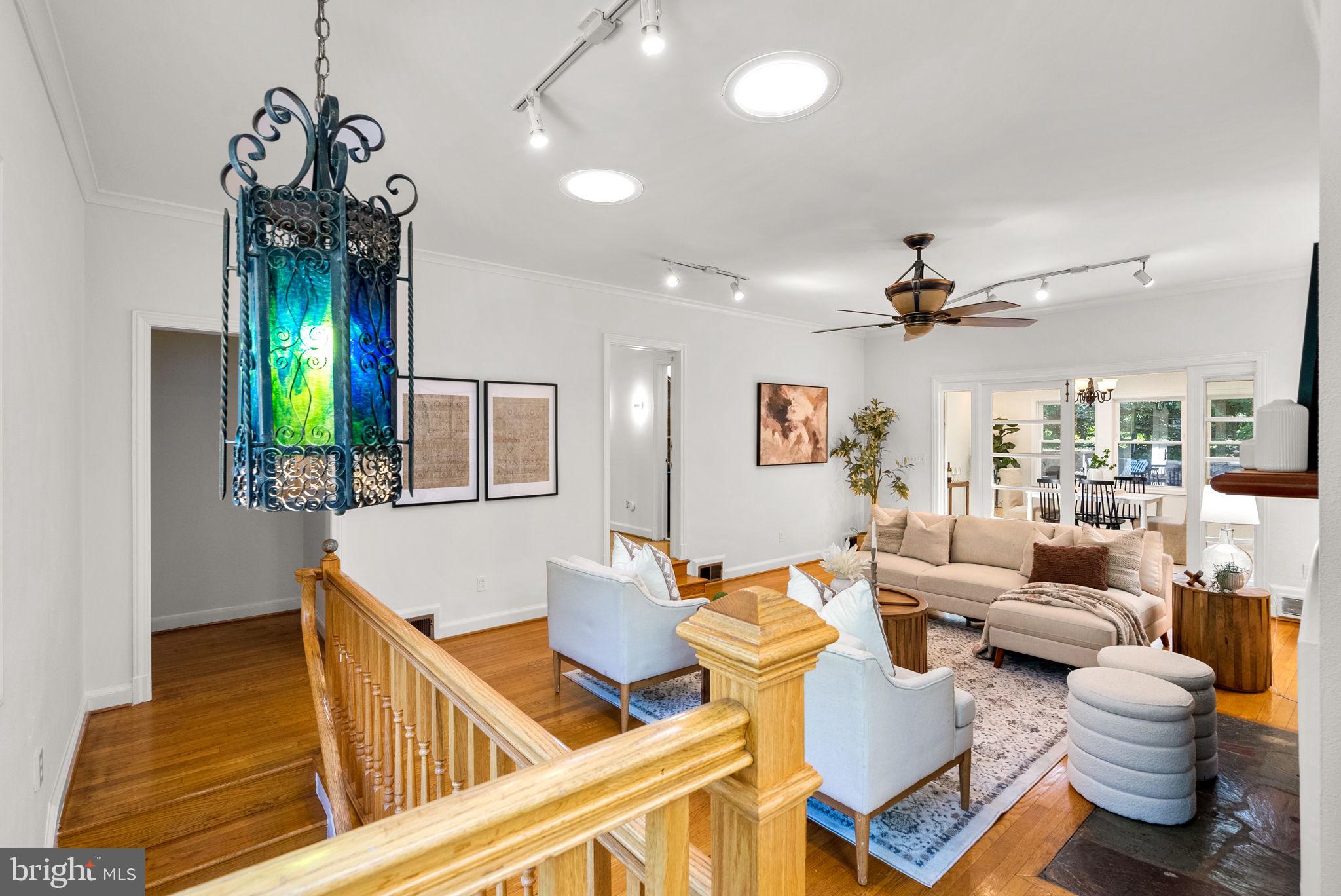 2816 Linden Lane Silver Spring, MD 20910 - Photo 6 of 62 a living room with furniture and a chandelier