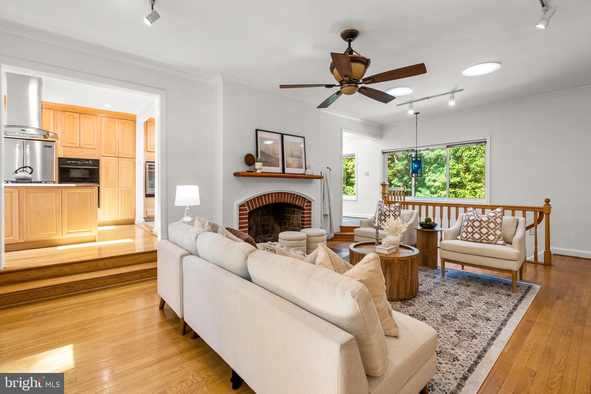 2816 Linden Lane Silver Spring, MD 20910 - Photo 7 of 62 a living room with furniture and a fireplace