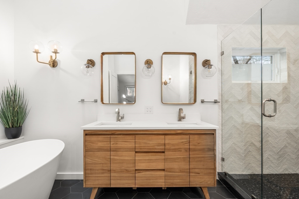 811 Hammond Street Chestnut Hill, MA 02467 - Photo 14 of 30 a bathroom with a sink and a mirror