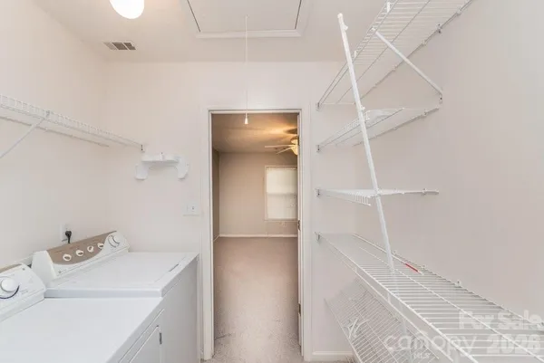 a bathroom with a sink and shower