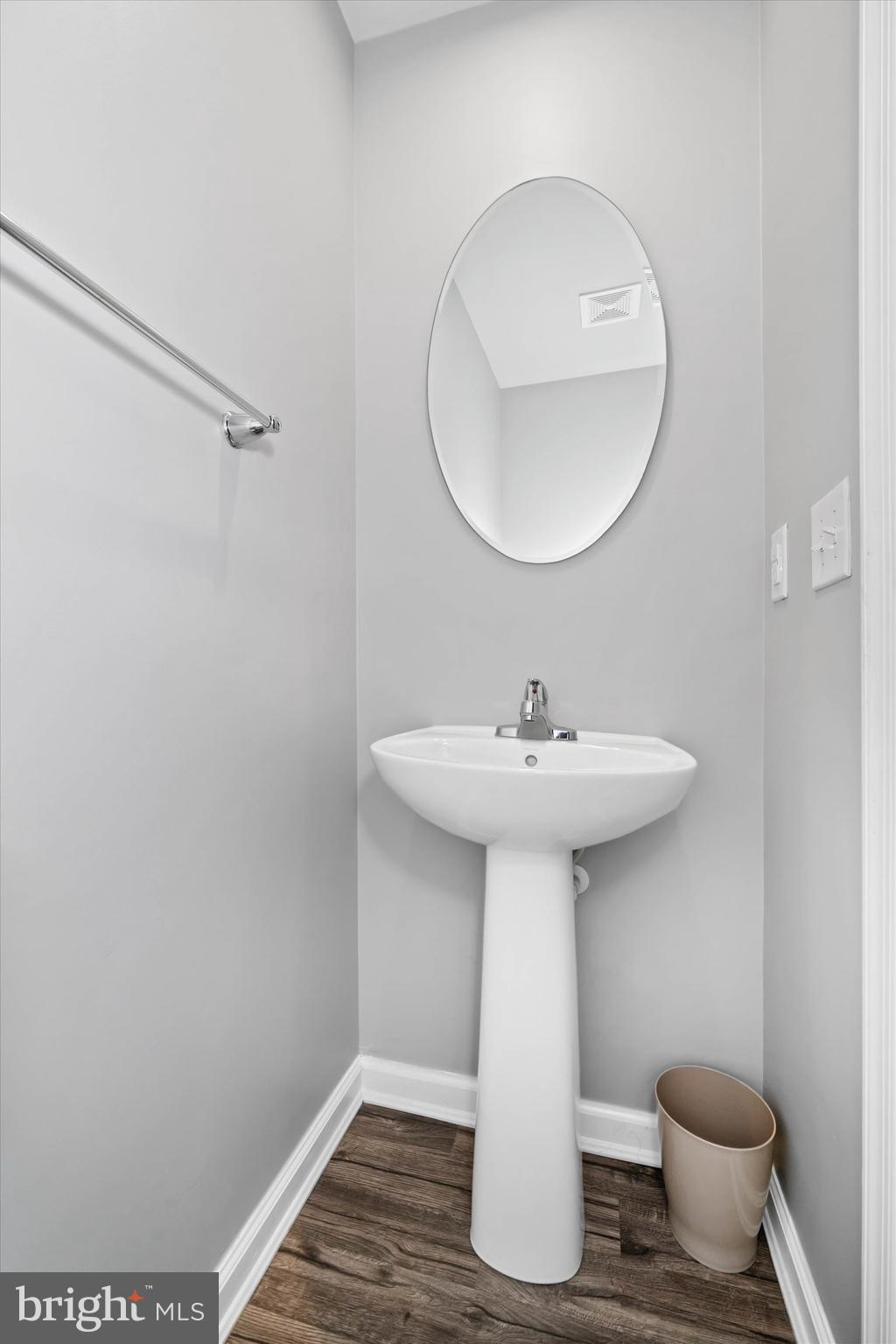 309 Mingo Way Townsend, DE 19734 - Photo 17 of 35 a bathroom with a sink toilet and a mirror