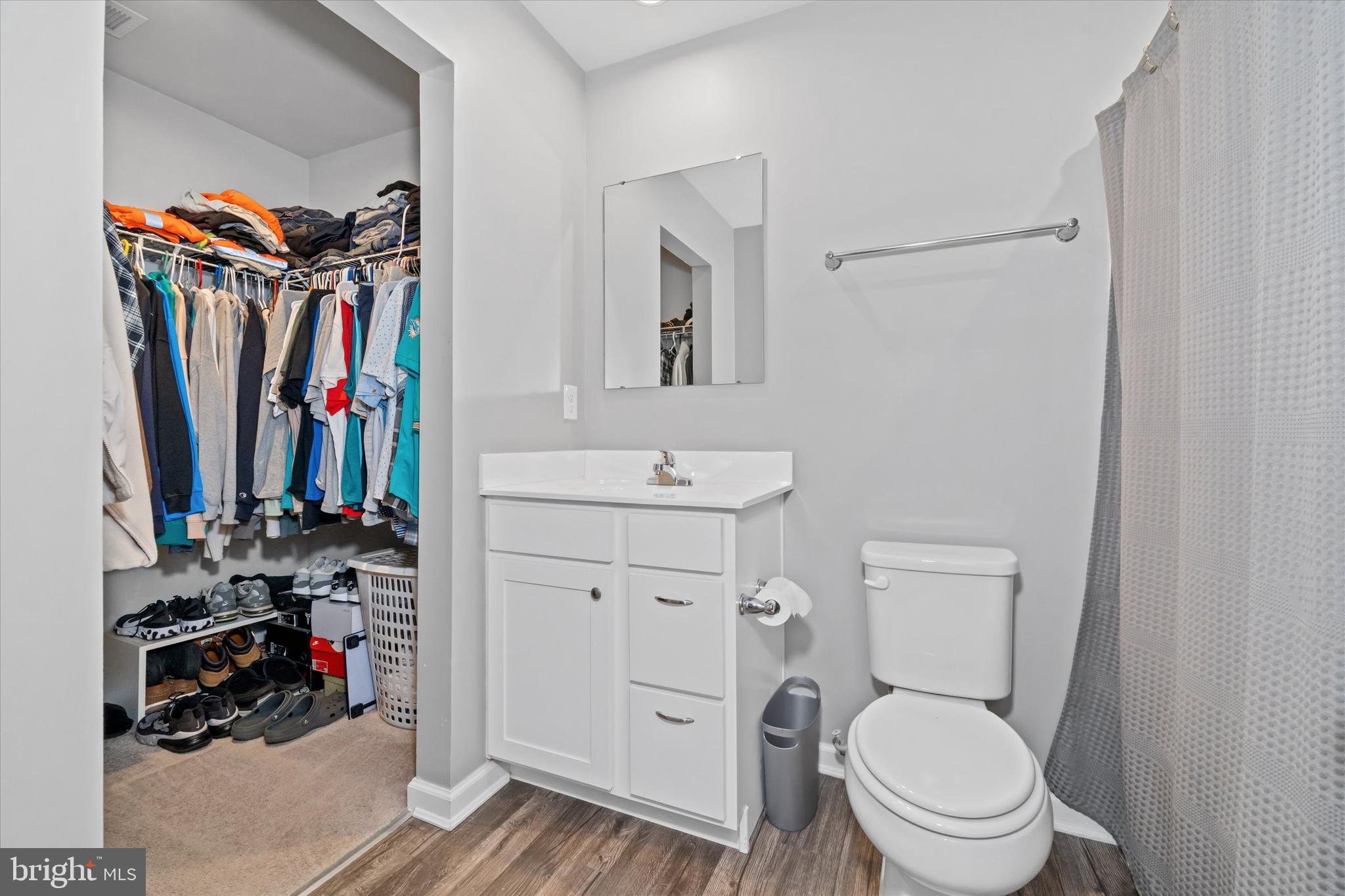 309 Mingo Way Townsend, DE 19734 - Photo 22 of 35 a bathroom with a toilet sink and mirror