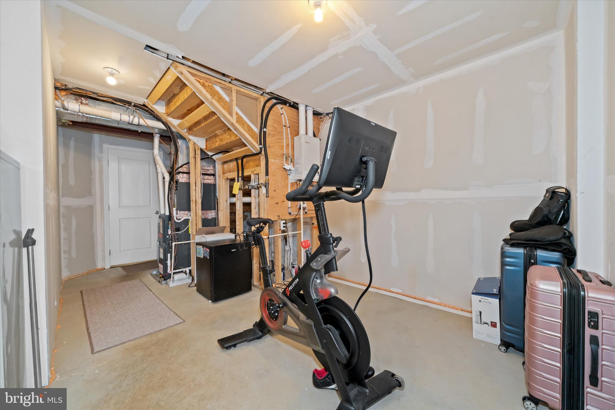 309 Mingo Way Townsend, DE 19734 - Photo 30 of 35 a view of a room with gym equipment