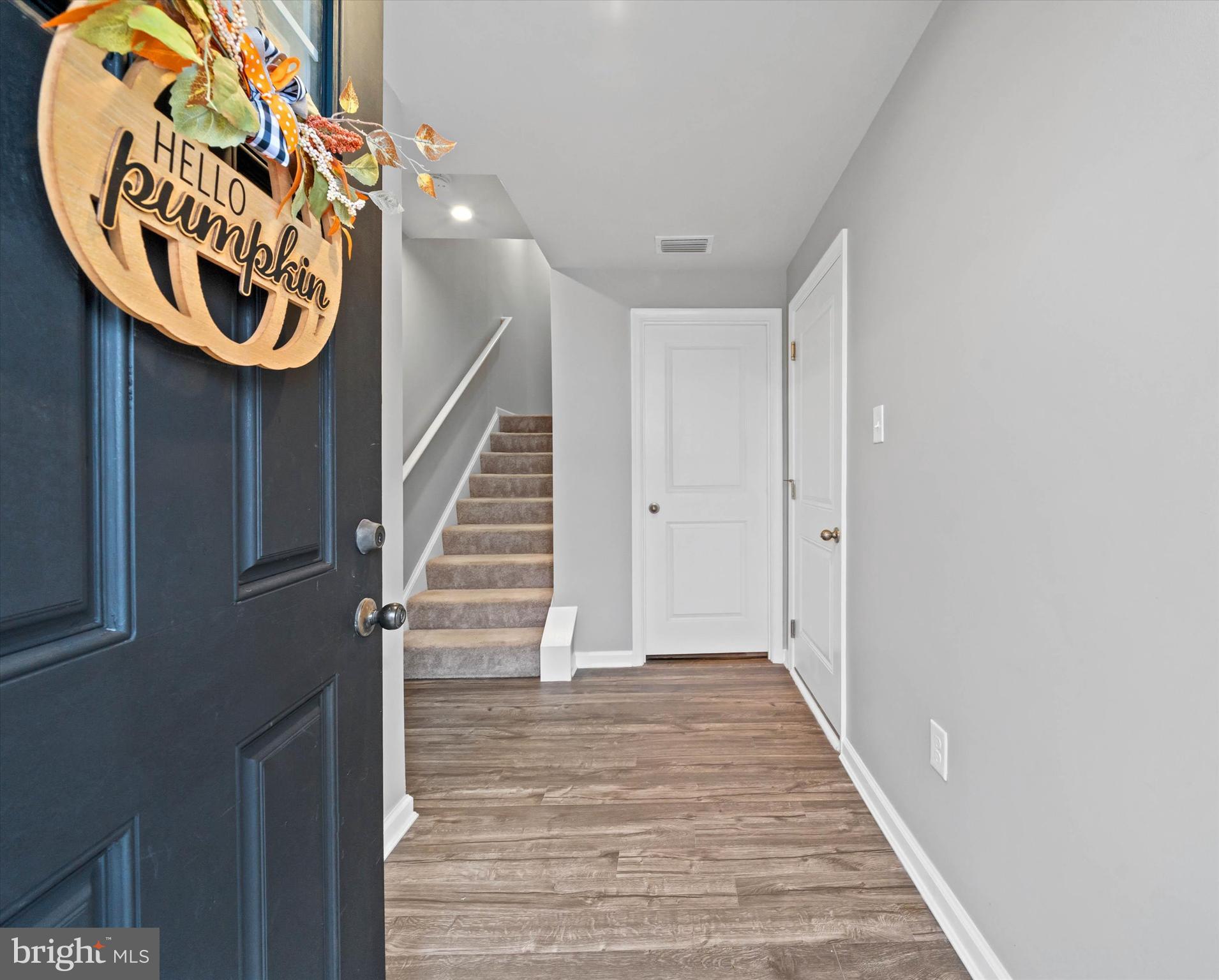 309 Mingo Way Townsend, DE 19734 - Photo 4 of 35 a view of an entryway with wooden floor
