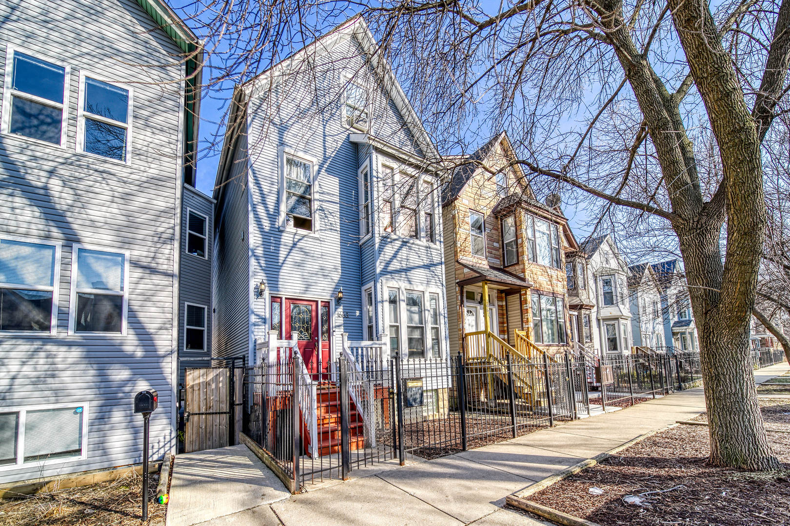 a view of a brick building with many windows