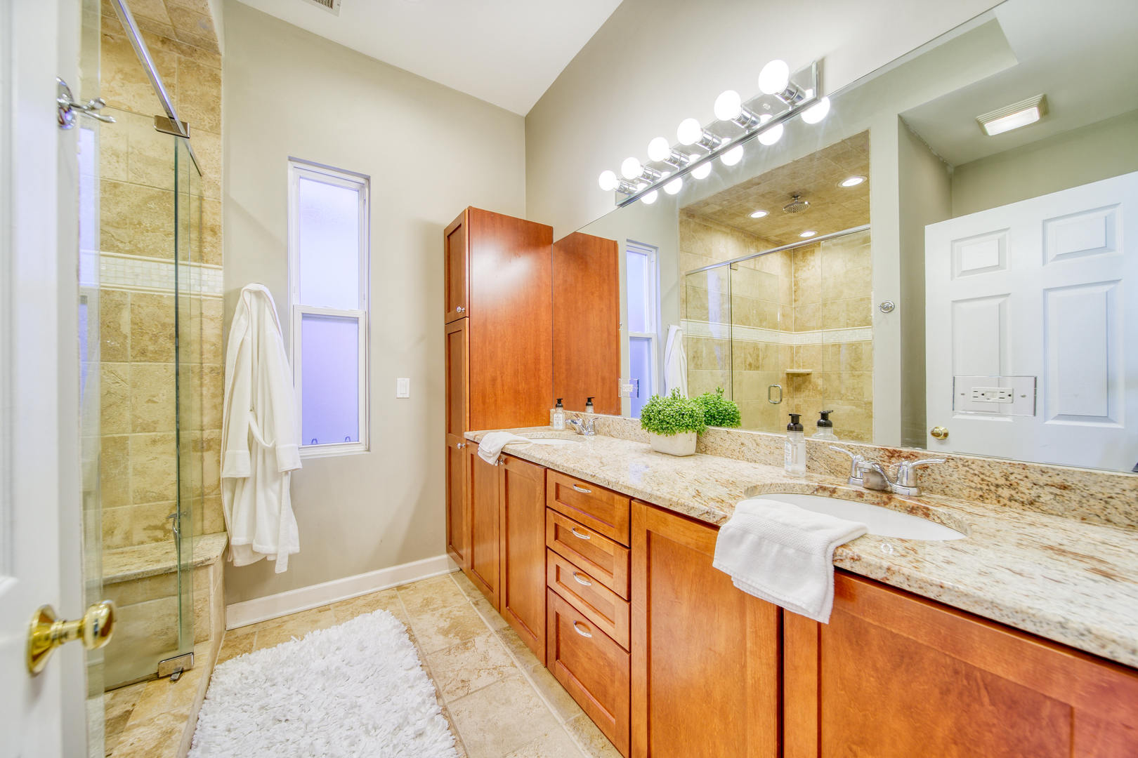 1663 North Richmond Street Chicago, IL 60647 - Photo 13 of 29 a bathroom with a granite countertop sink and a mirror