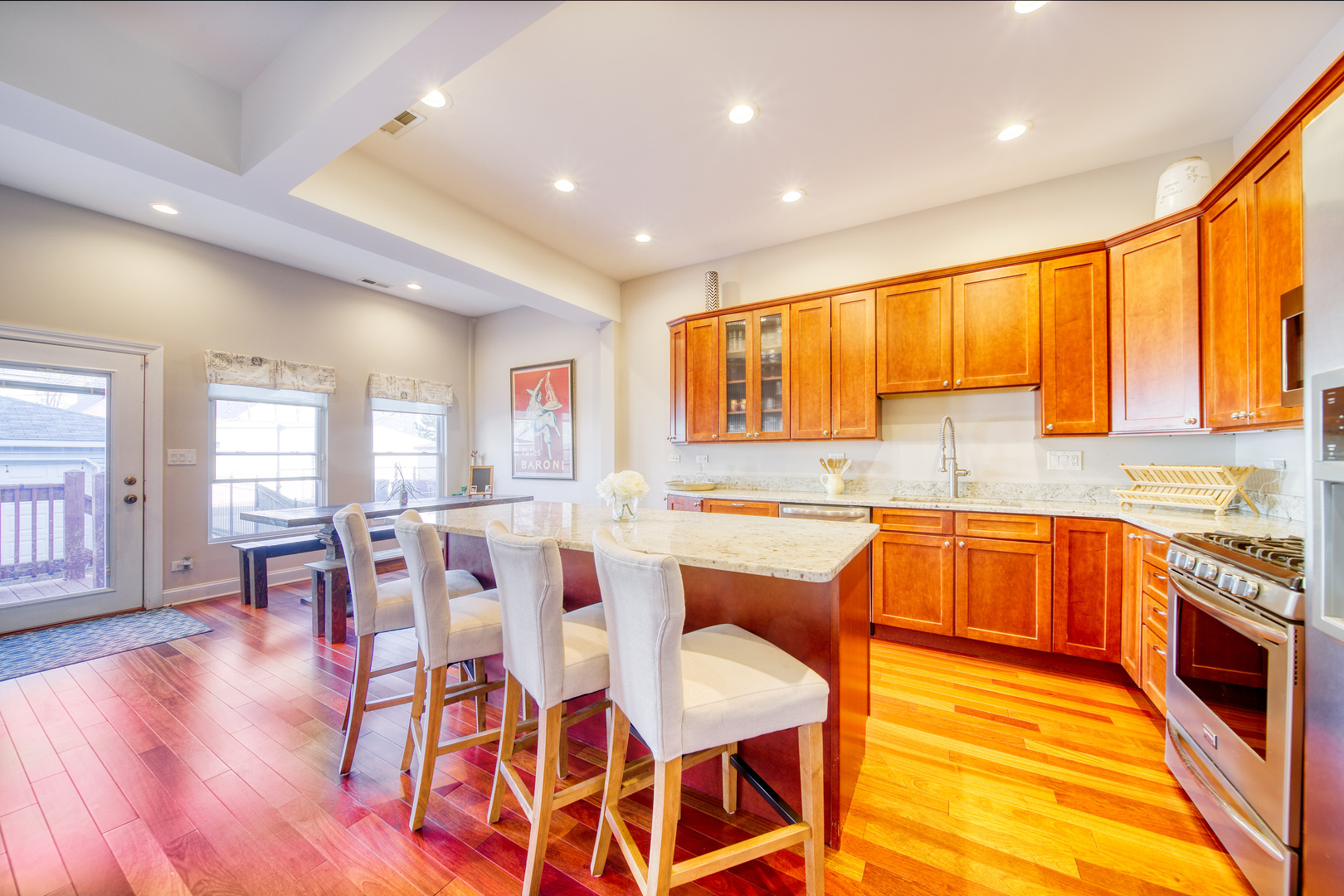 1663 North Richmond Street Chicago, IL 60647 - Photo 6 of 29 a large kitchen with a table and chairs in it