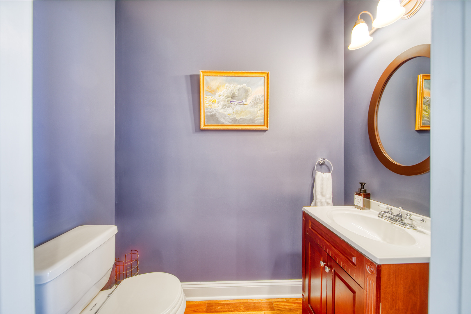 1663 North Richmond Street Chicago, IL 60647 - Photo 10 of 29 a bathroom with a toilet a sink and a mirror