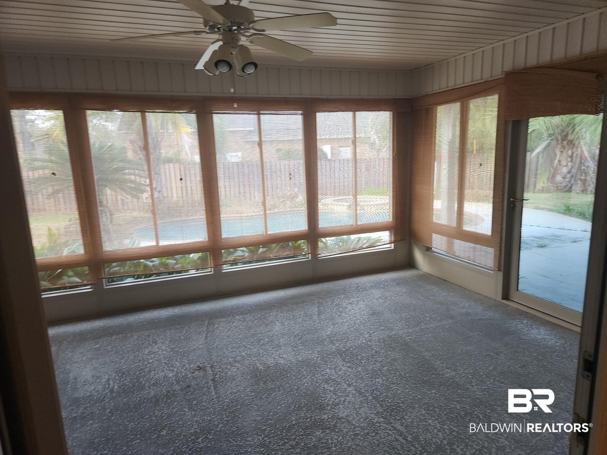 9425 Autauga Bend Daphne, AL 36526 - Photo 12 of 15 Unfurnished sunroom featuring carpet