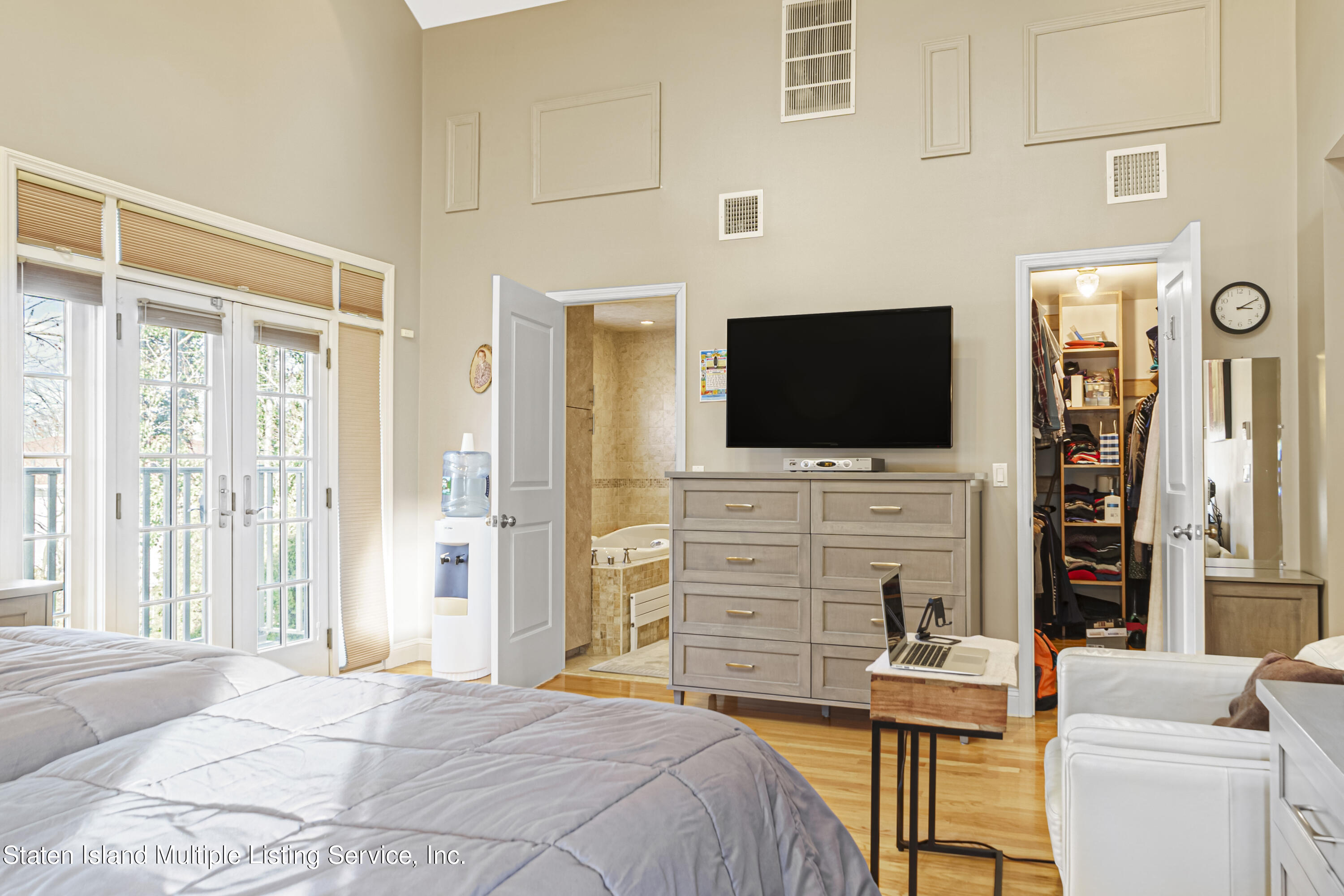 19 Bascom Place Staten Island, NY 10314 - Photo 20 of 54 a bedroom with a bed and a flat screen tv