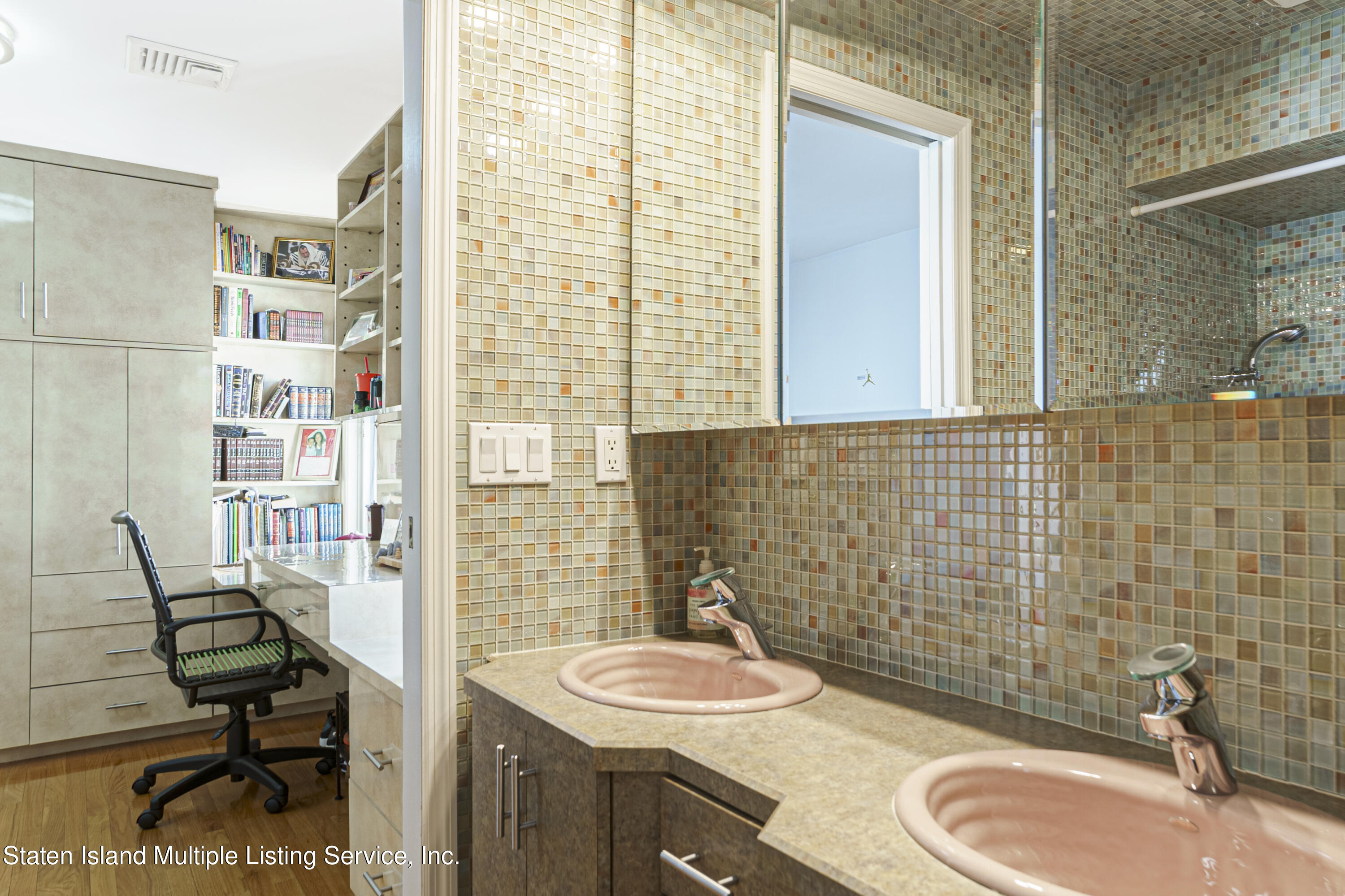 19 Bascom Place Staten Island, NY 10314 - Photo 34 of 54 a bathroom with a sink a toilet and shower