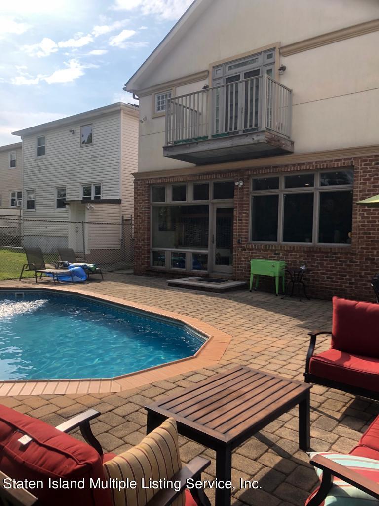 19 Bascom Place Staten Island, NY 10314 - Photo 51 of 54 a view of a chairs and table in the patio