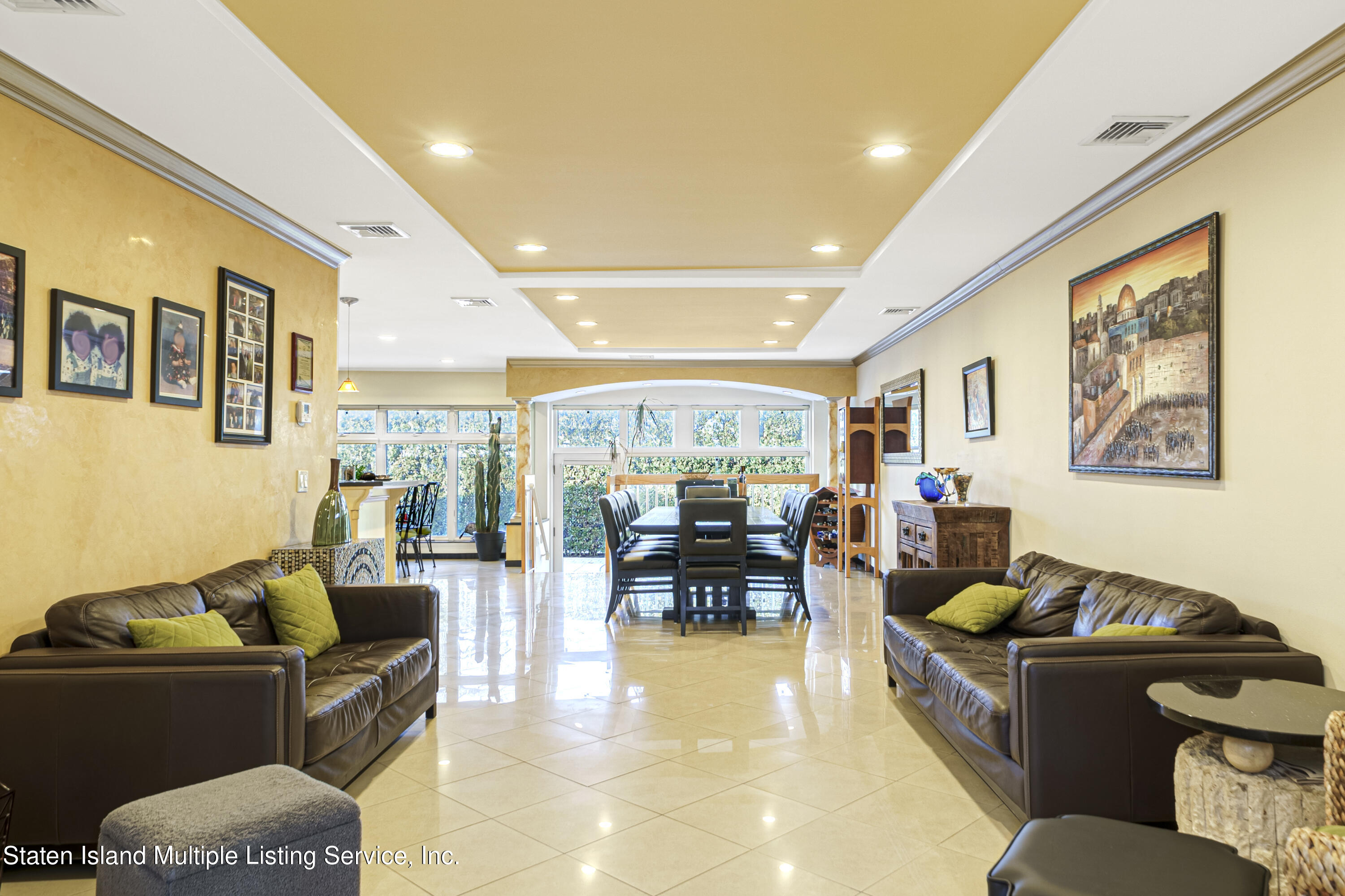 19 Bascom Place Staten Island, NY 10314 - Photo 8 of 54 a living room with furniture and a large window